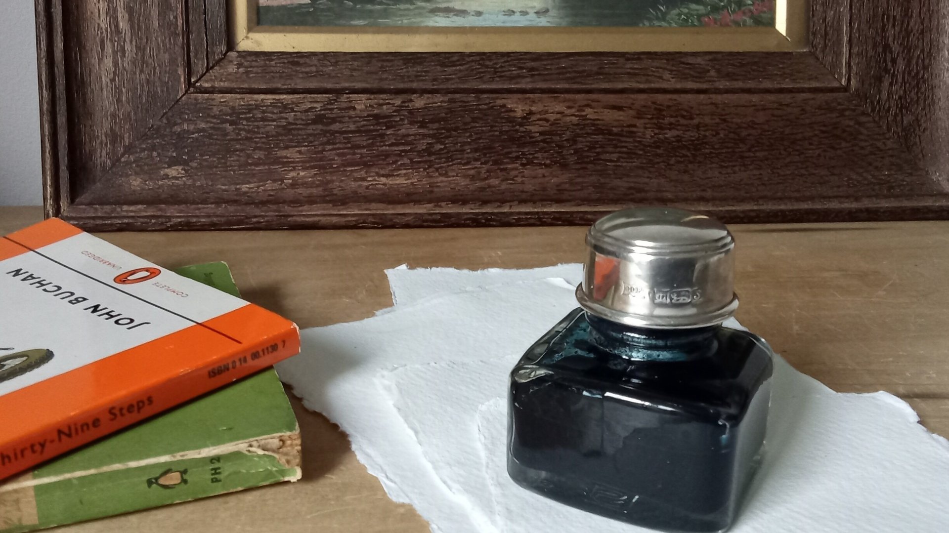 J Herbin Paris ink bottle with silver lid and pen rest