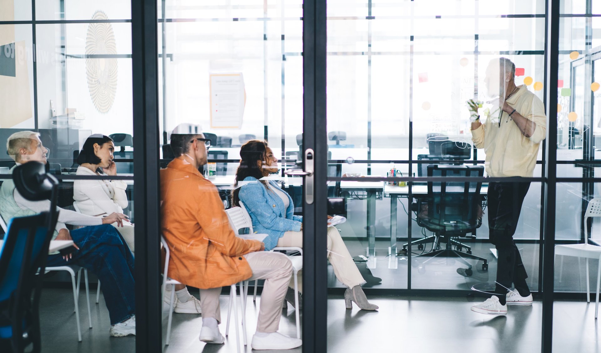 a kitchen with a sink, stove and a window