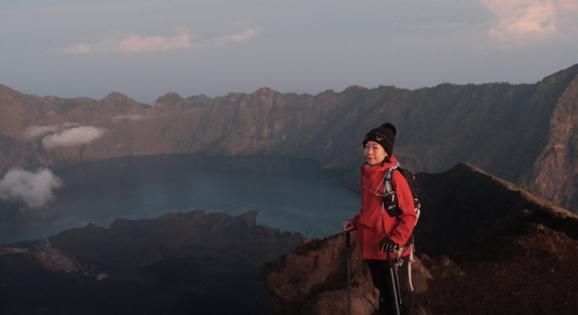 man walking on rock mountain