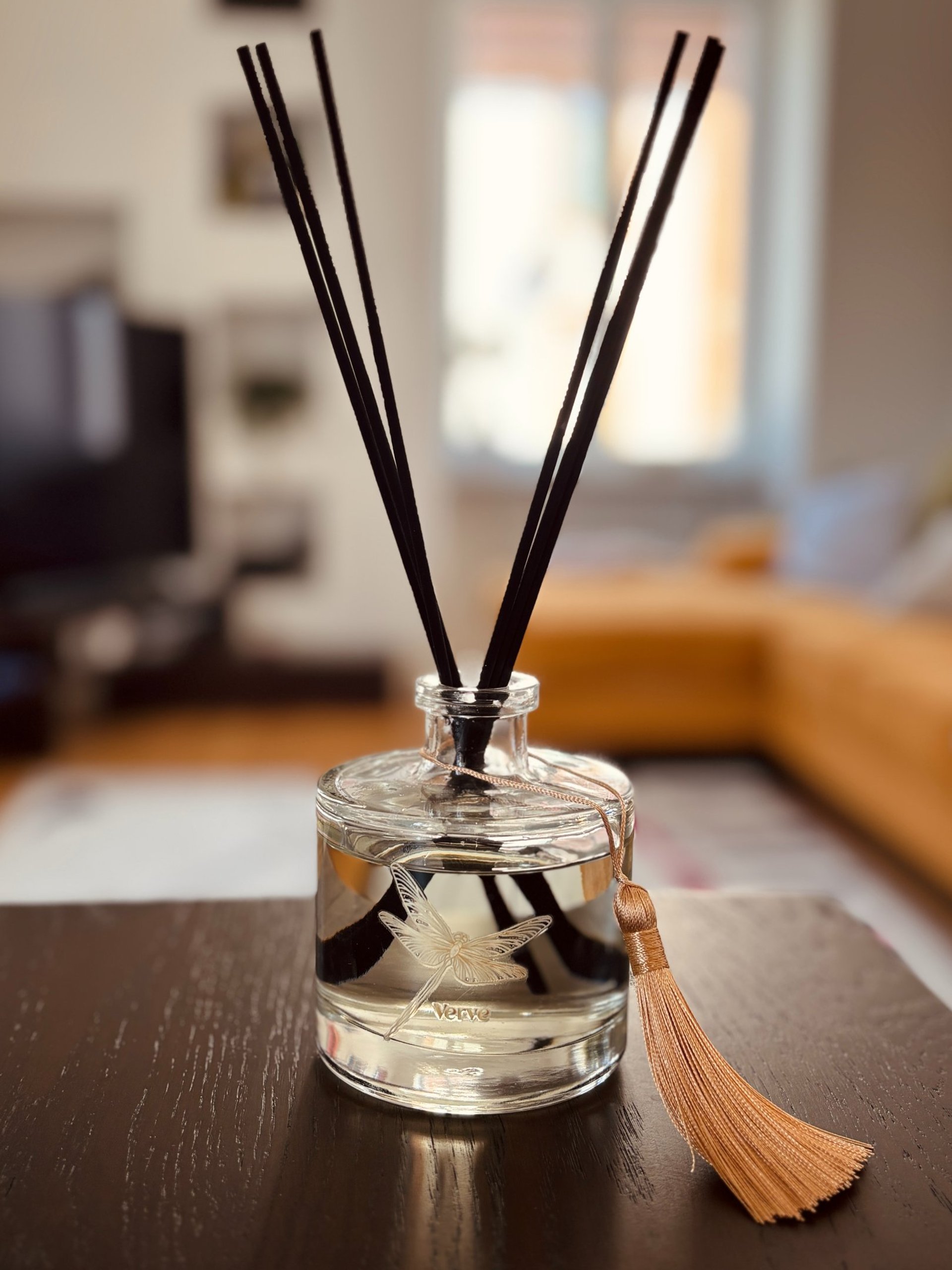 elegant verve reed diffuser on wooden table
