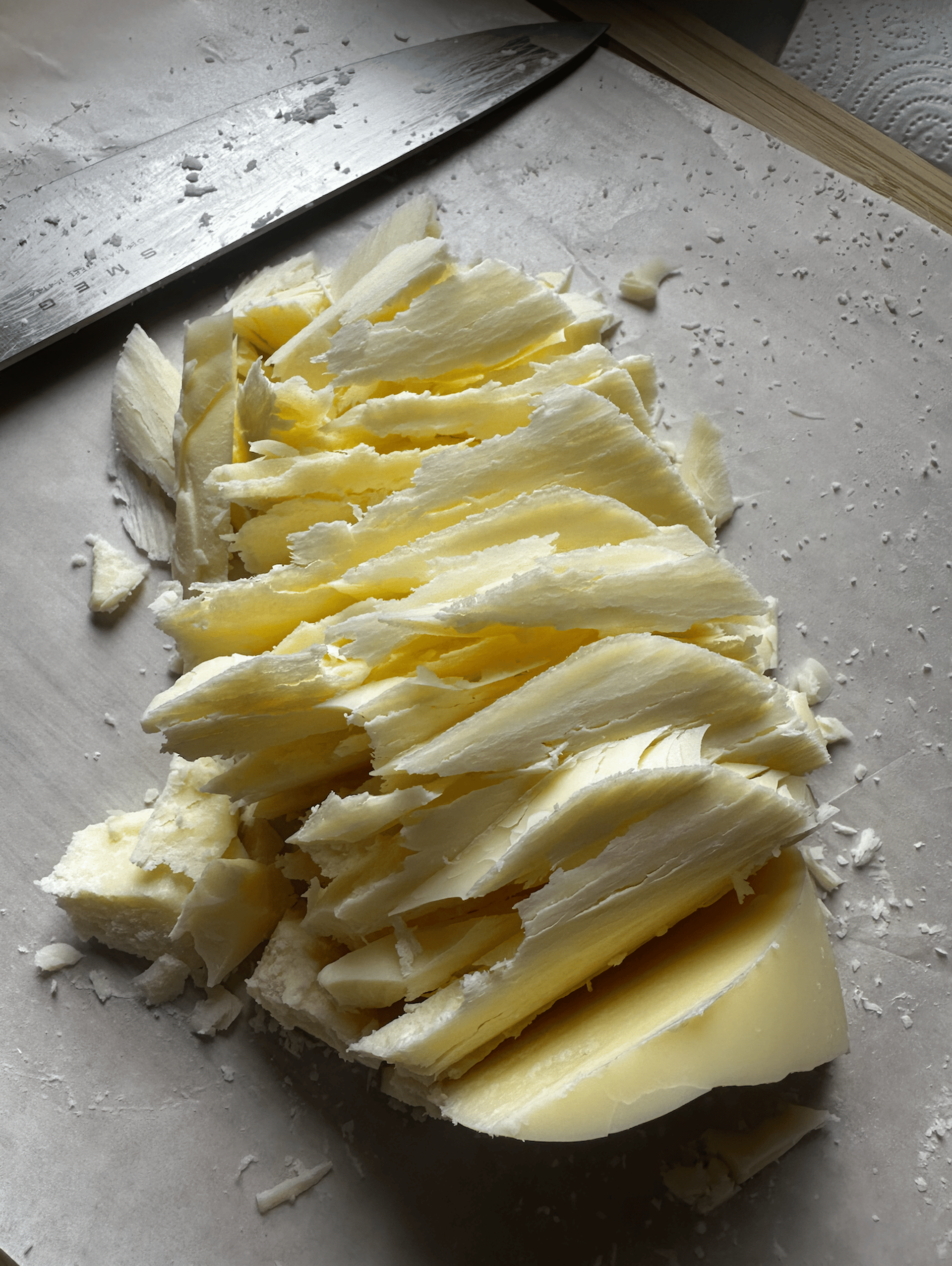 woman wearing yellow long-sleeved dress under white clouds and blue sky during daytime