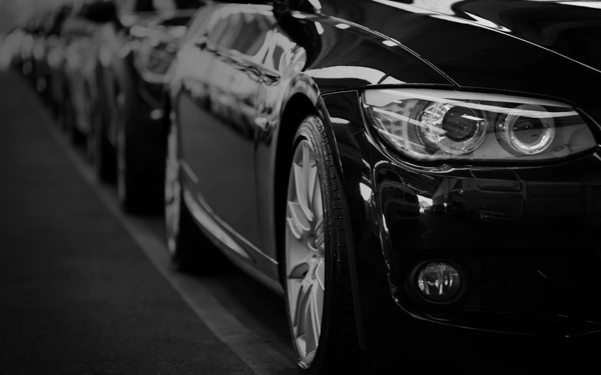 black and brown leather padded tub sofa