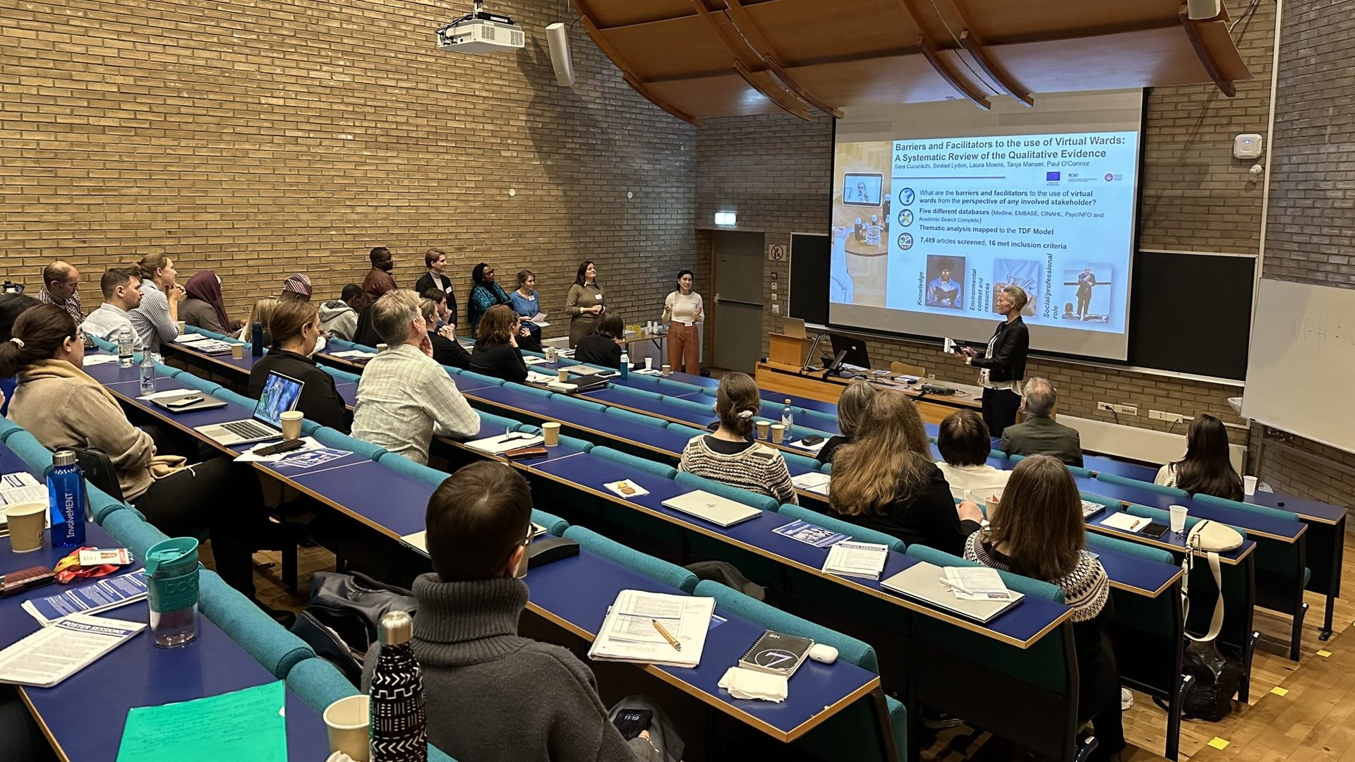 black and brown leather padded tub sofa