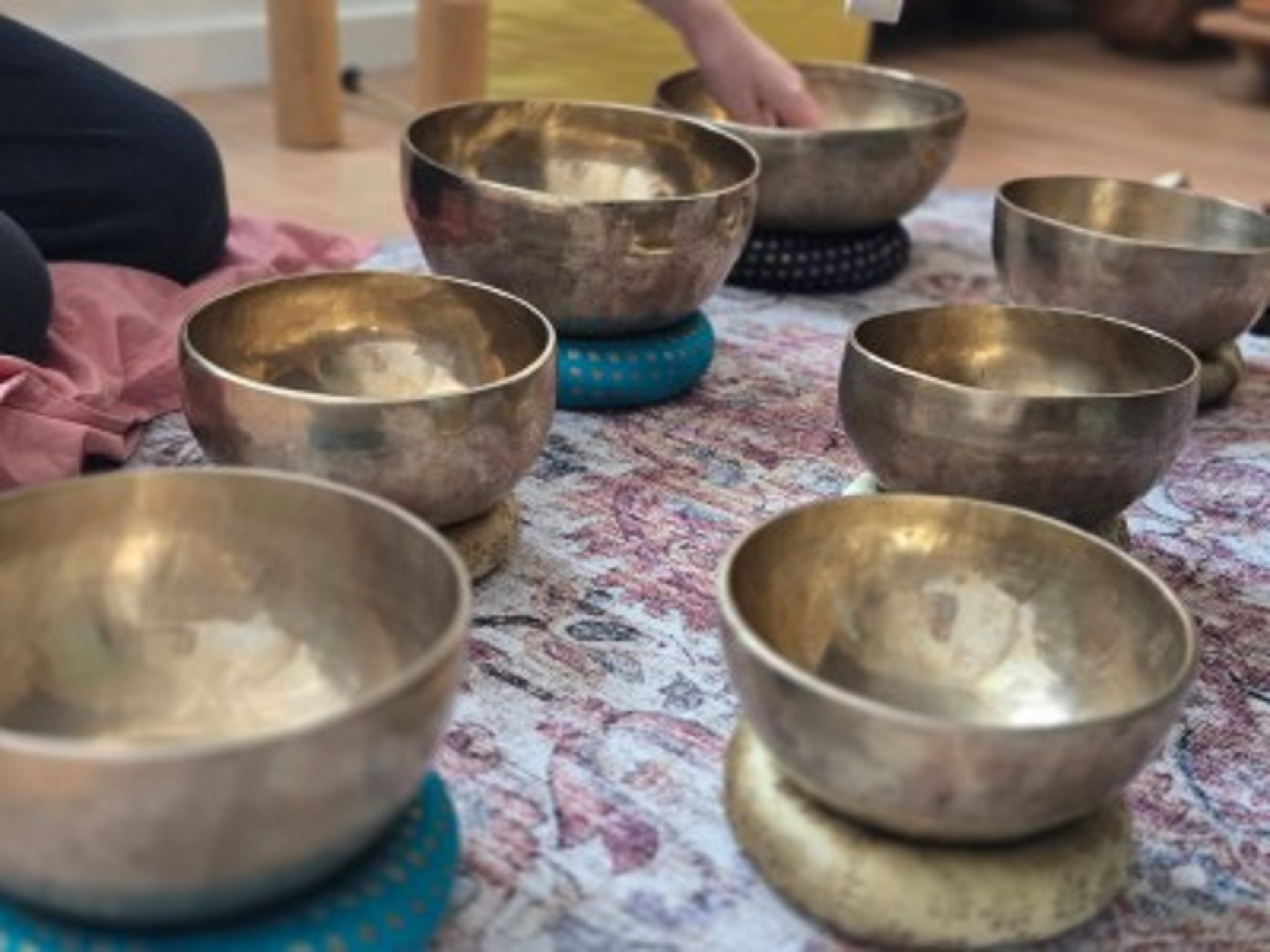 an abstract photo of a curved building with a blue sky in the background