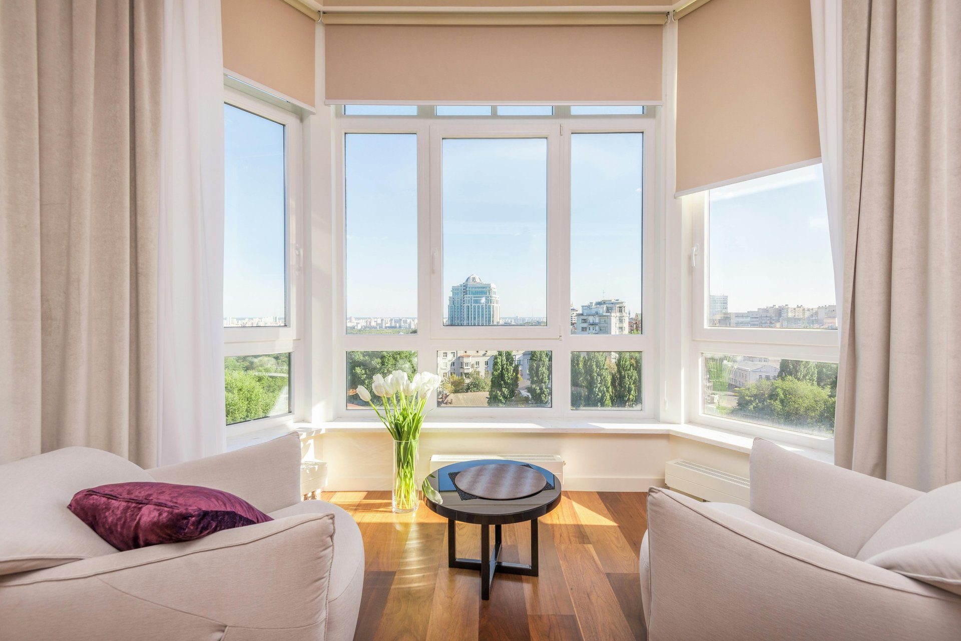 A couple of chairs sitting in front of a window