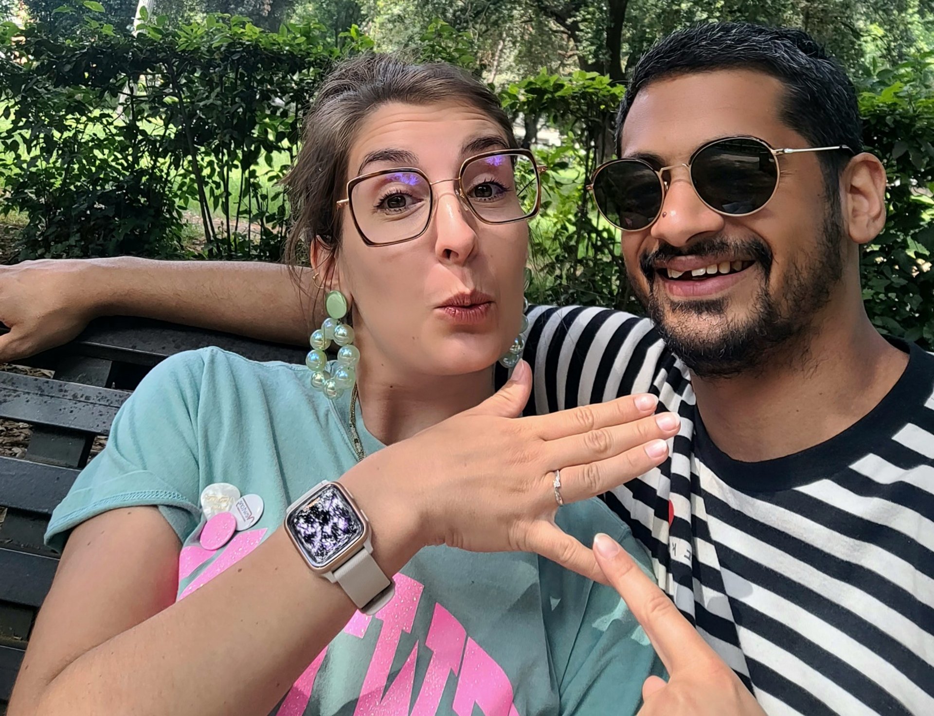 couple wearing silver-colored rings