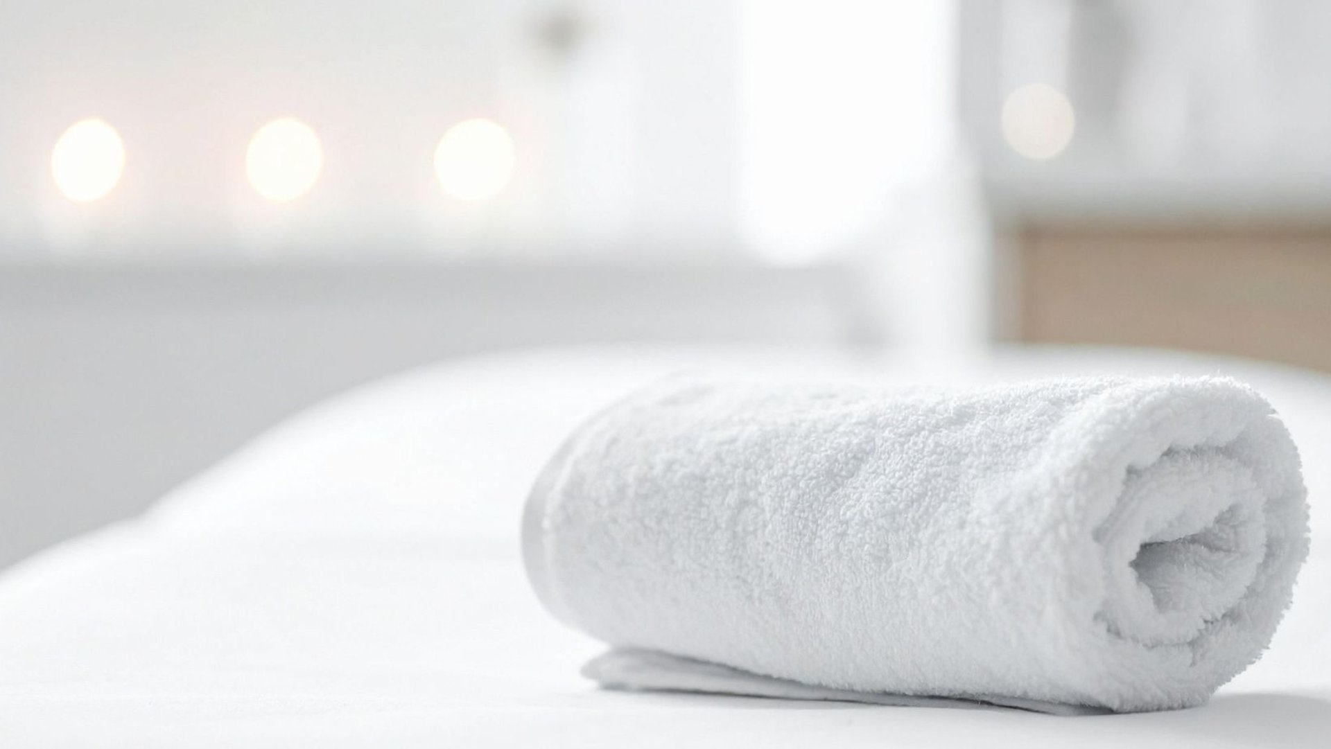 a woman getting a back massage at a spa