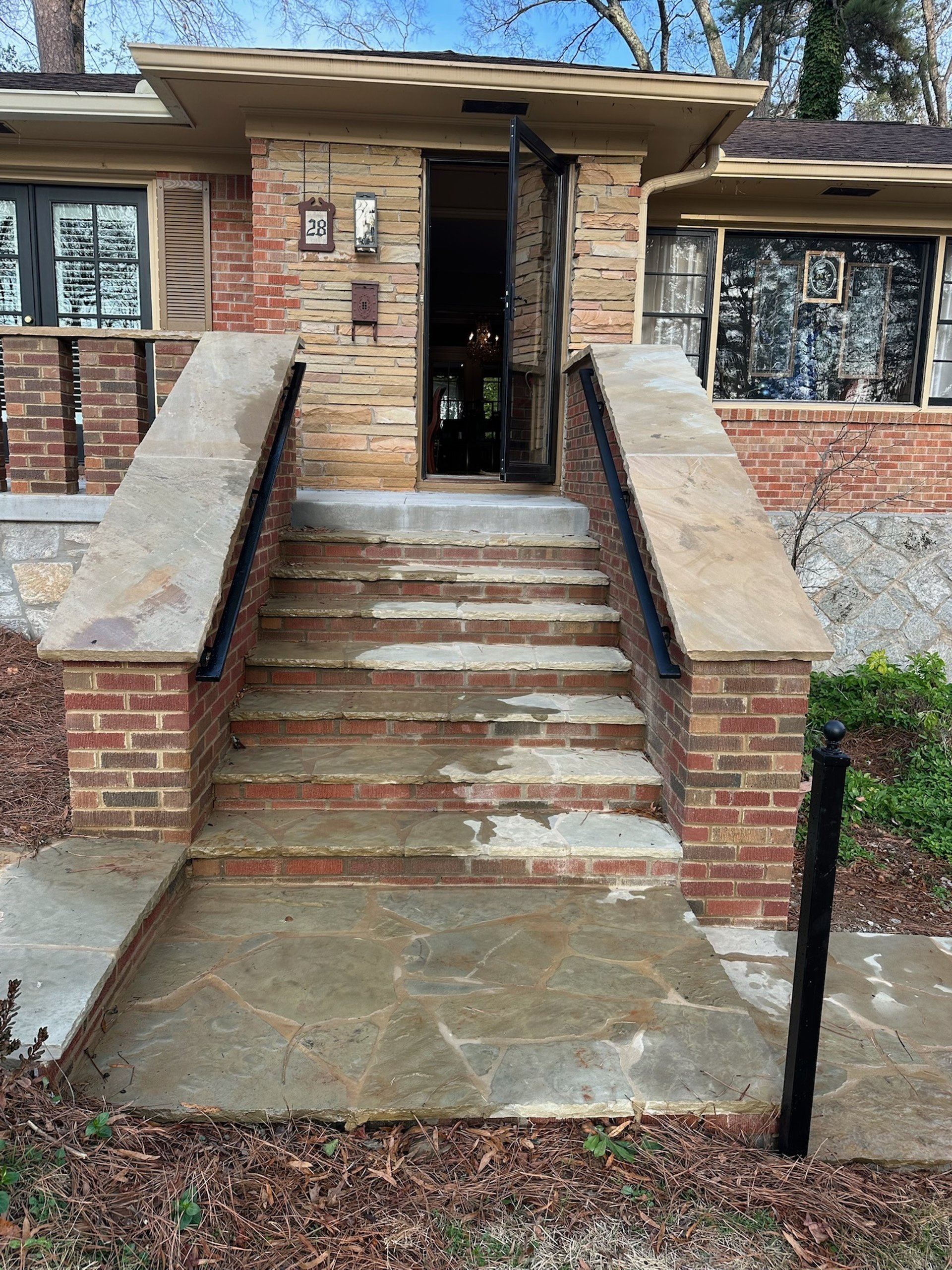 man in blue t-shirt and brown shorts wearing black helmet