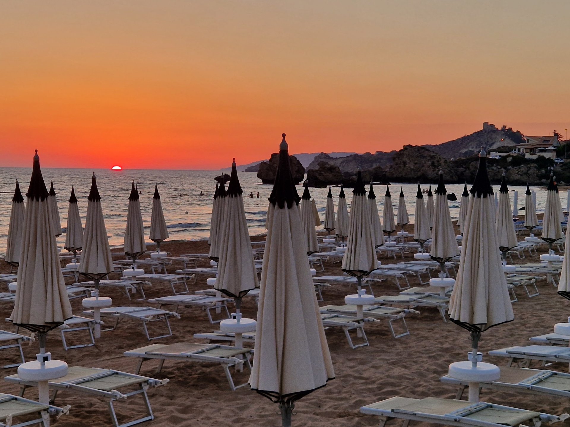 black and brown leather padded tub sofa
