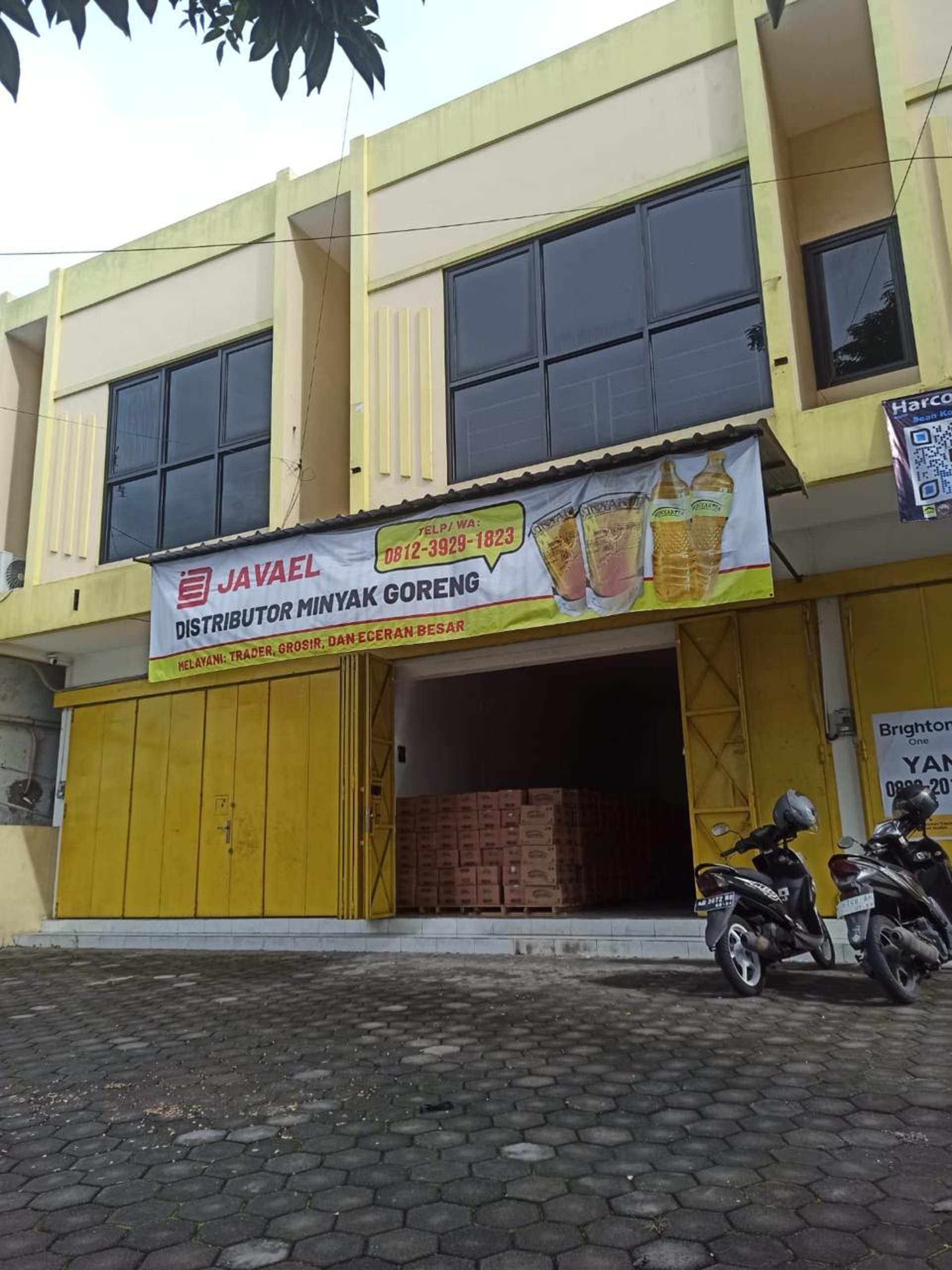 woman wearing yellow long-sleeved dress under white clouds and blue sky during daytime