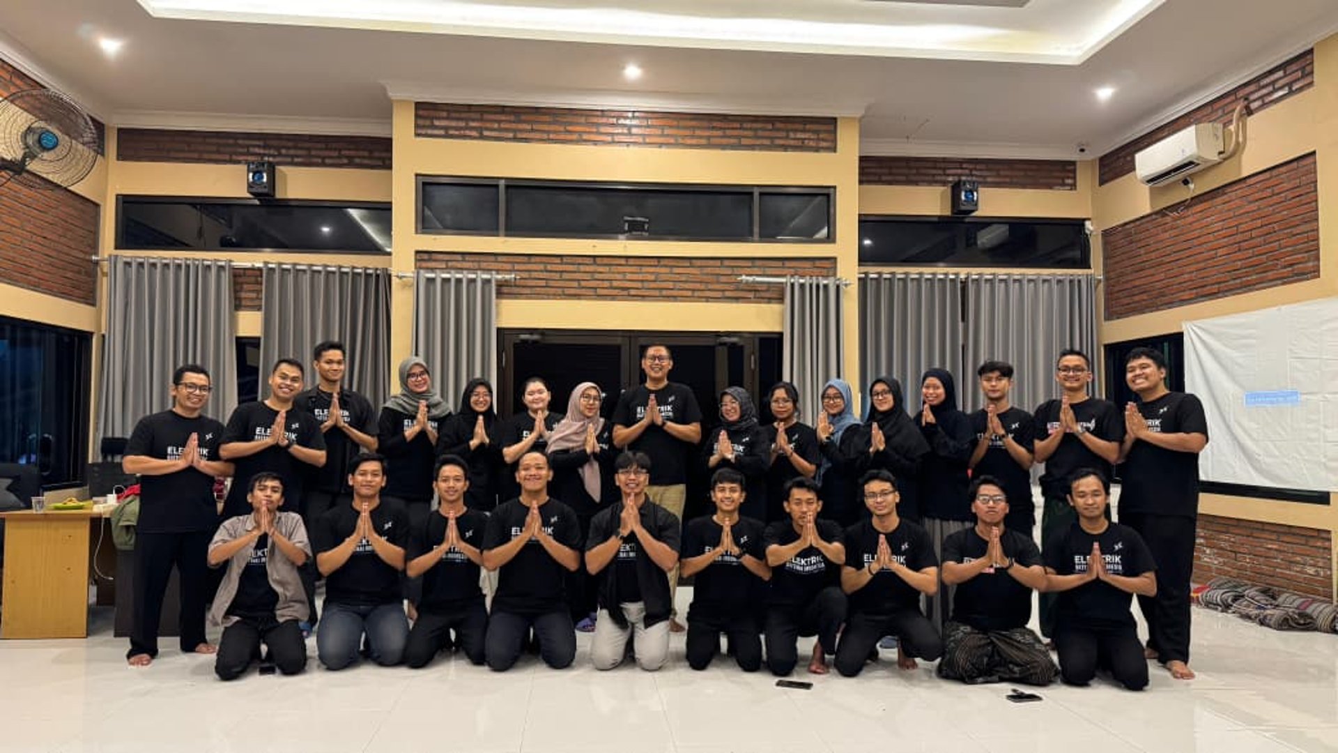 an abstract photo of a curved building with a blue sky in the background