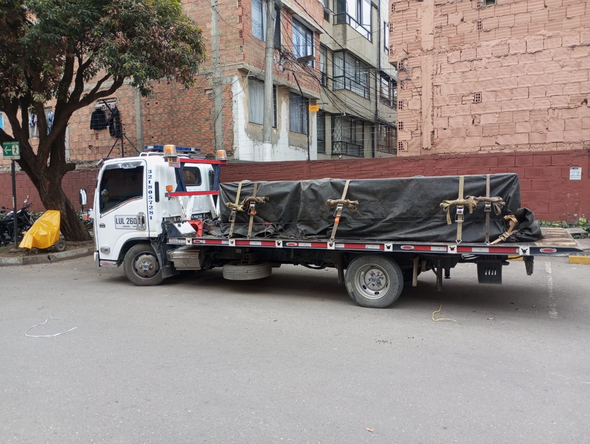 woman wearing yellow long-sleeved dress under white clouds and blue sky during daytime