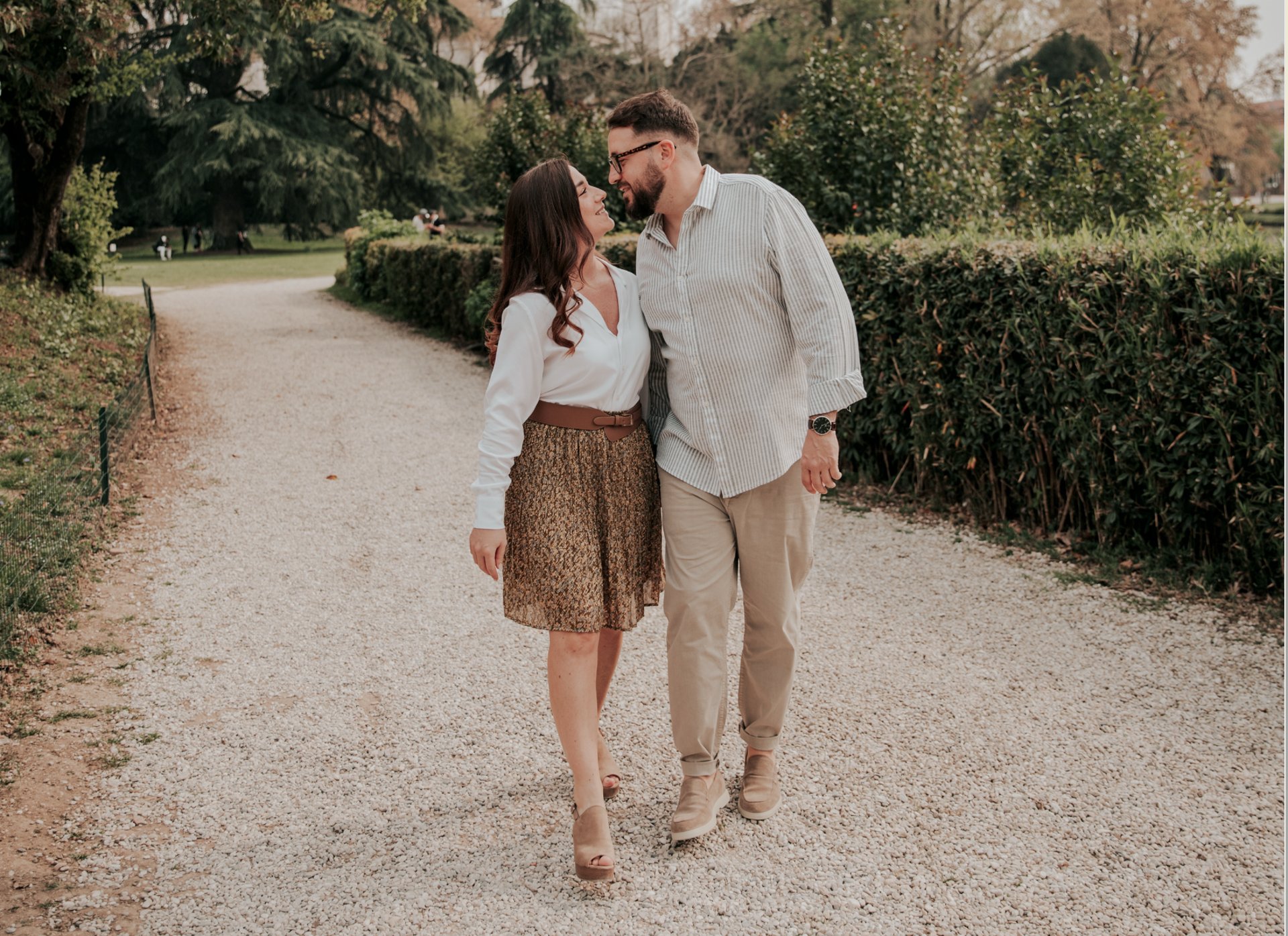an abstract photo of a curved building with a blue sky in the background