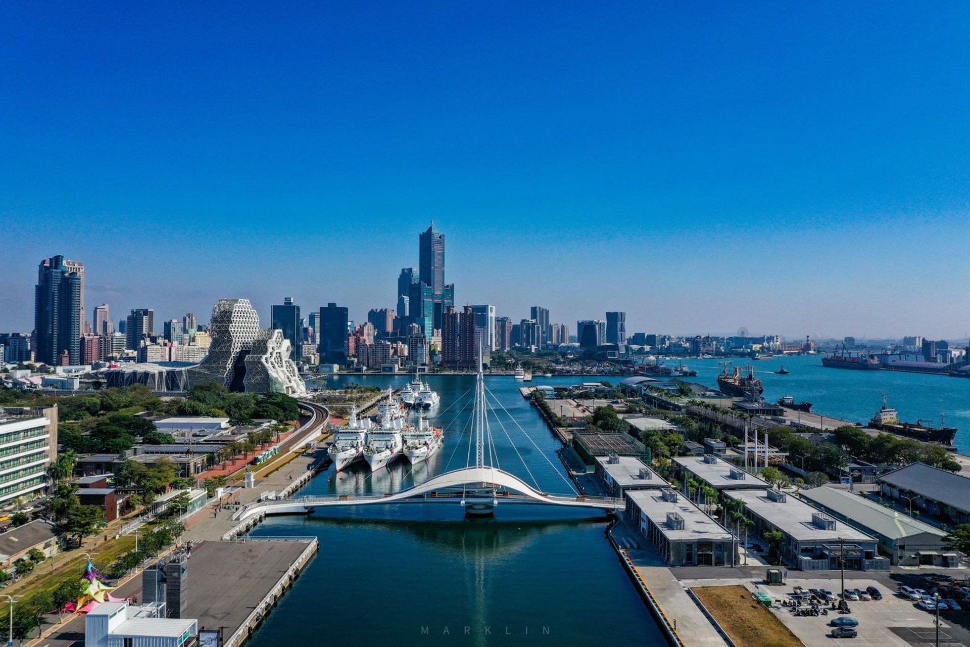 black and brown leather padded tub sofa
