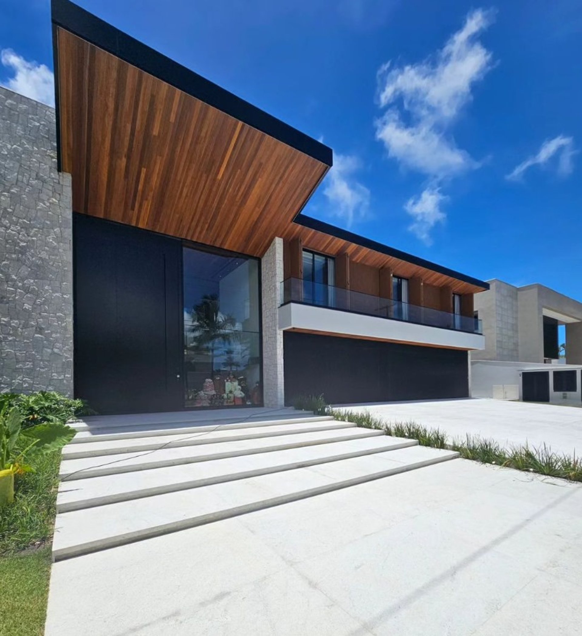 black and brown leather padded tub sofa