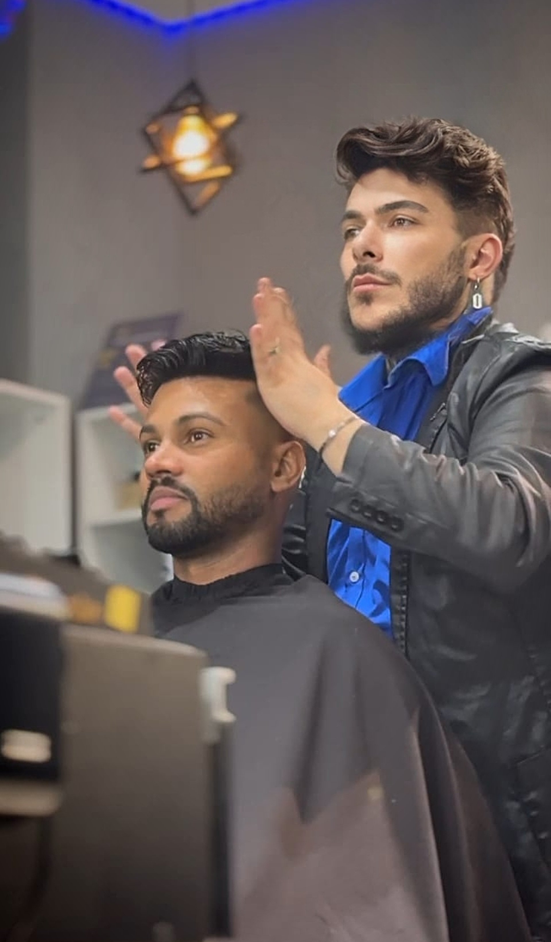 black and brown leather padded tub sofa