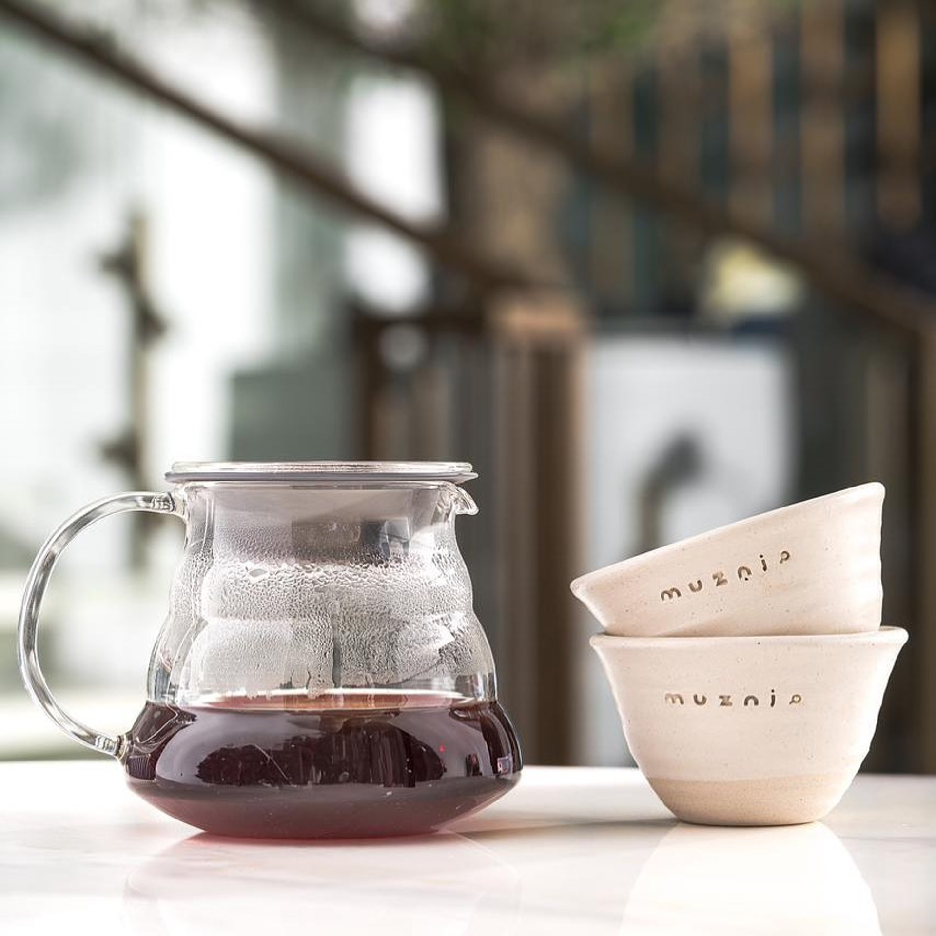 a close up of a black and brown abstract painting