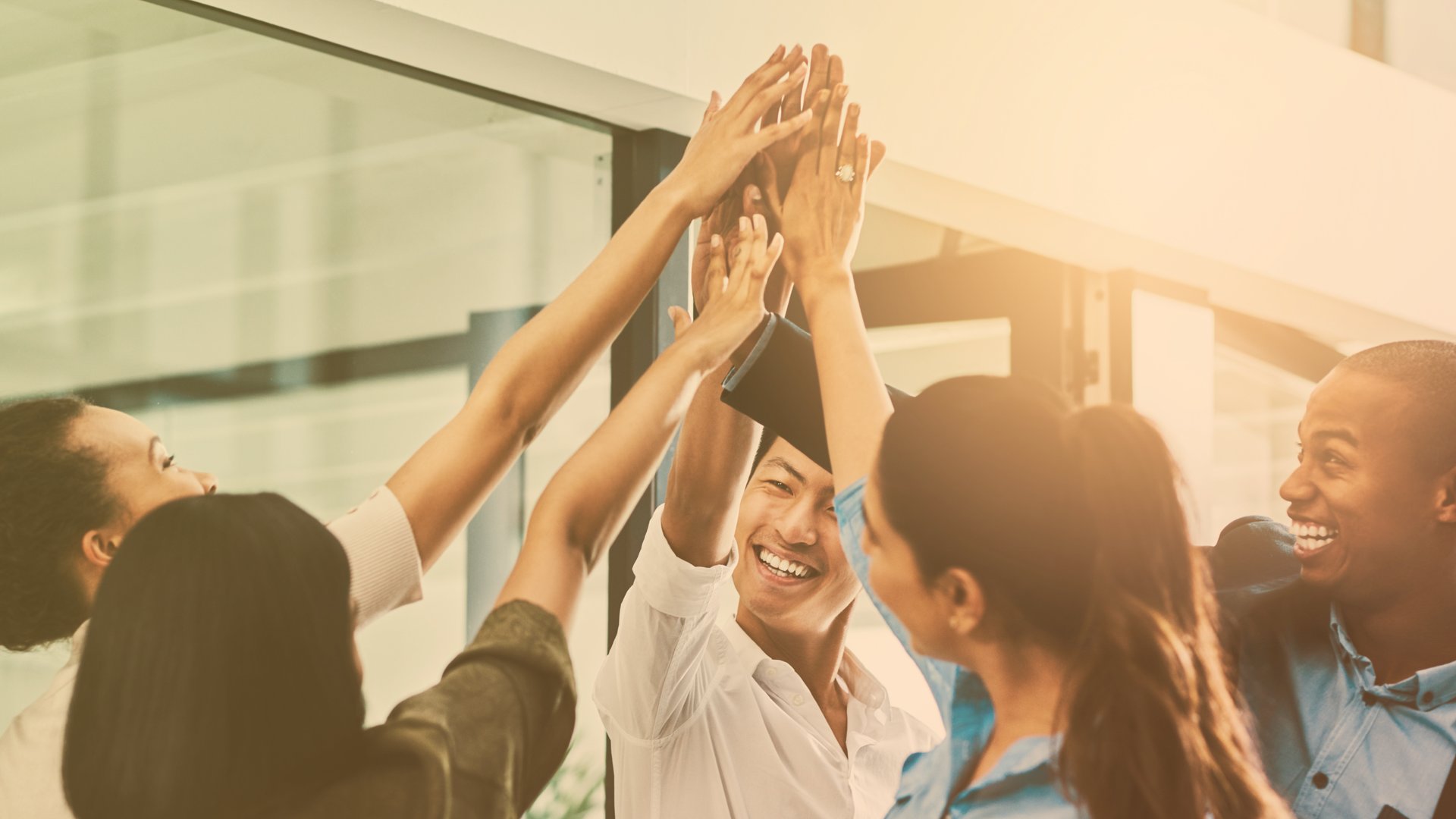 an abstract photo of a curved building with a blue sky in the background