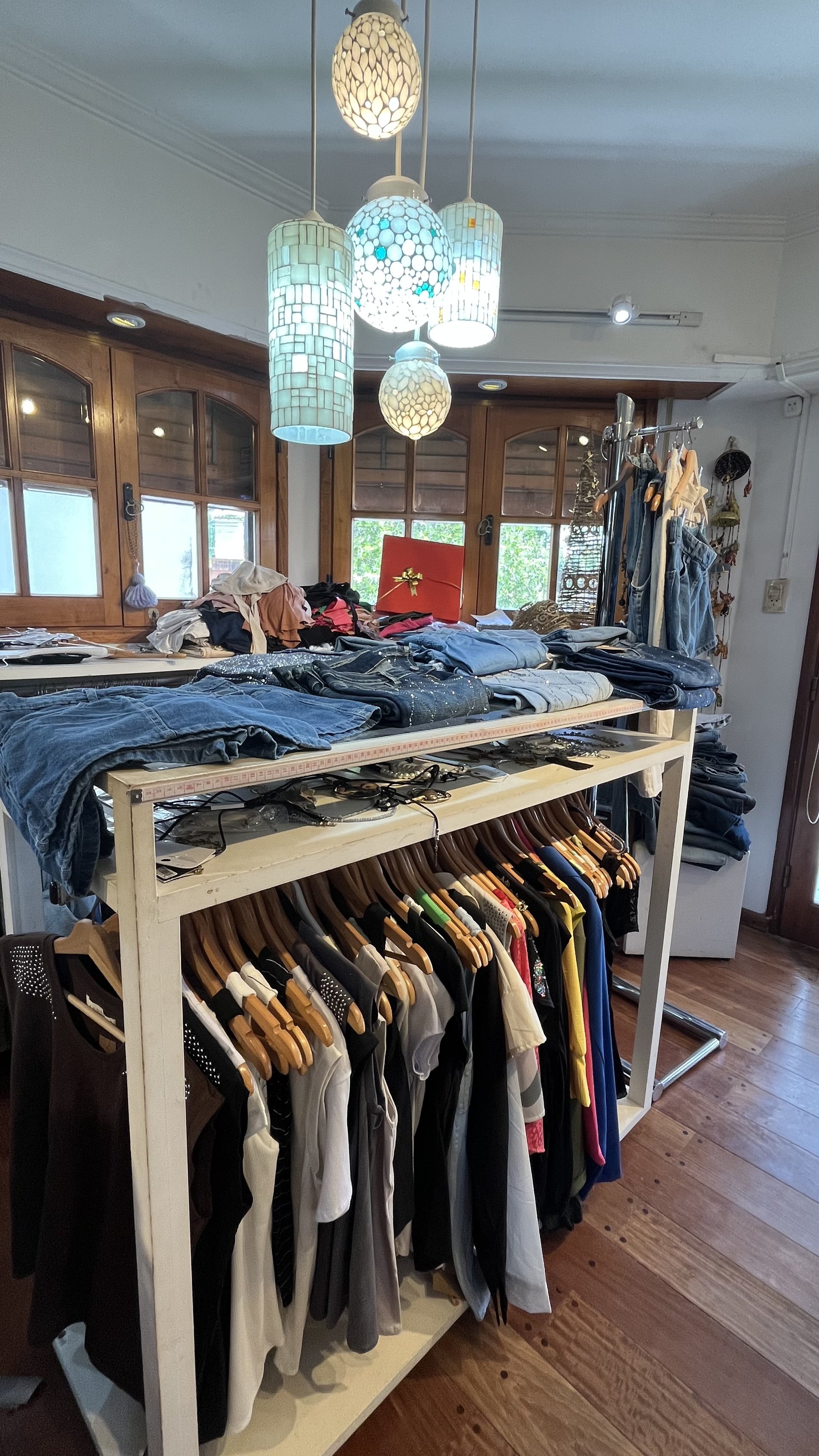 an abstract photo of a curved building with a blue sky in the background