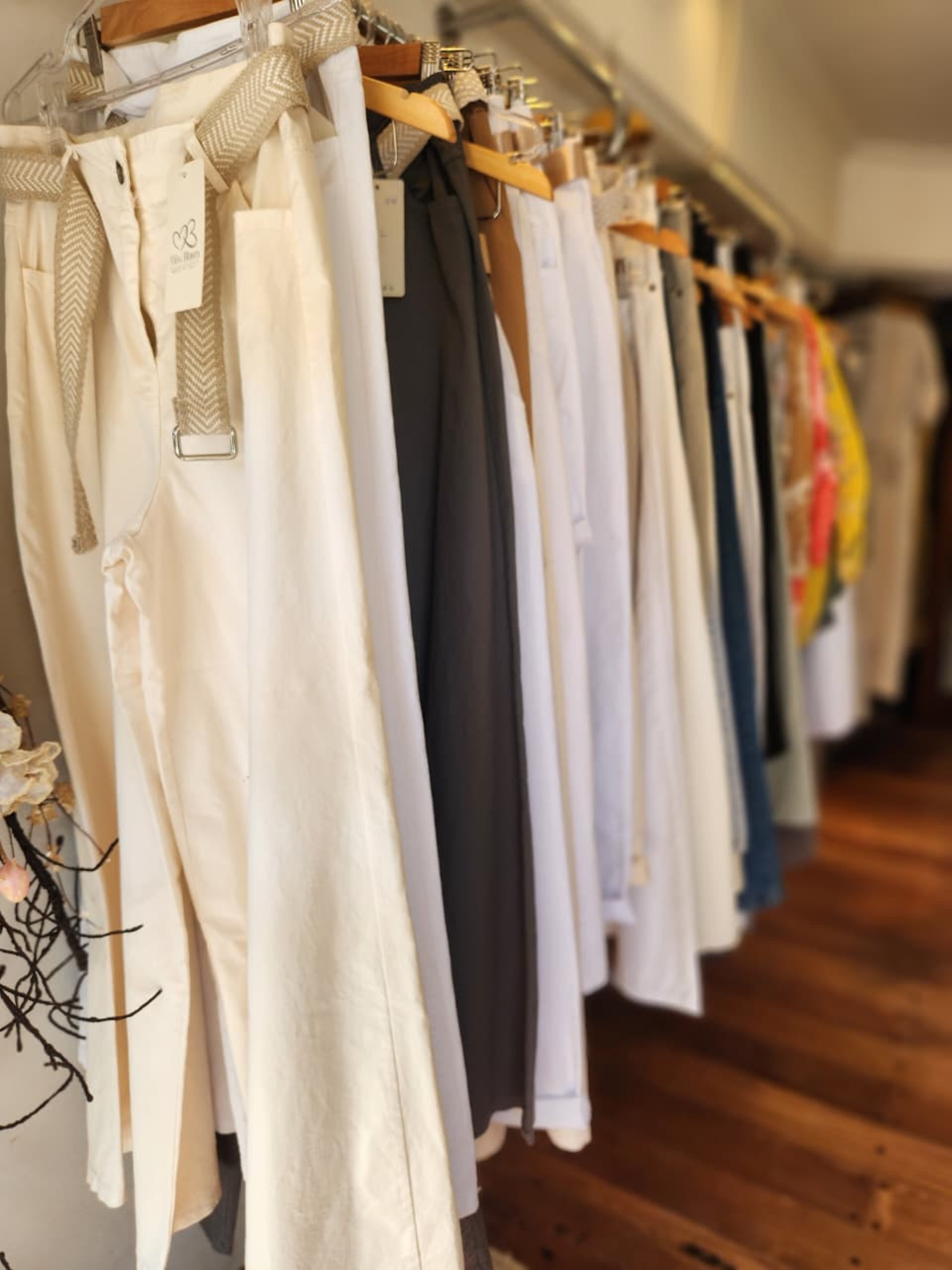 an abstract photo of a curved building with a blue sky in the background