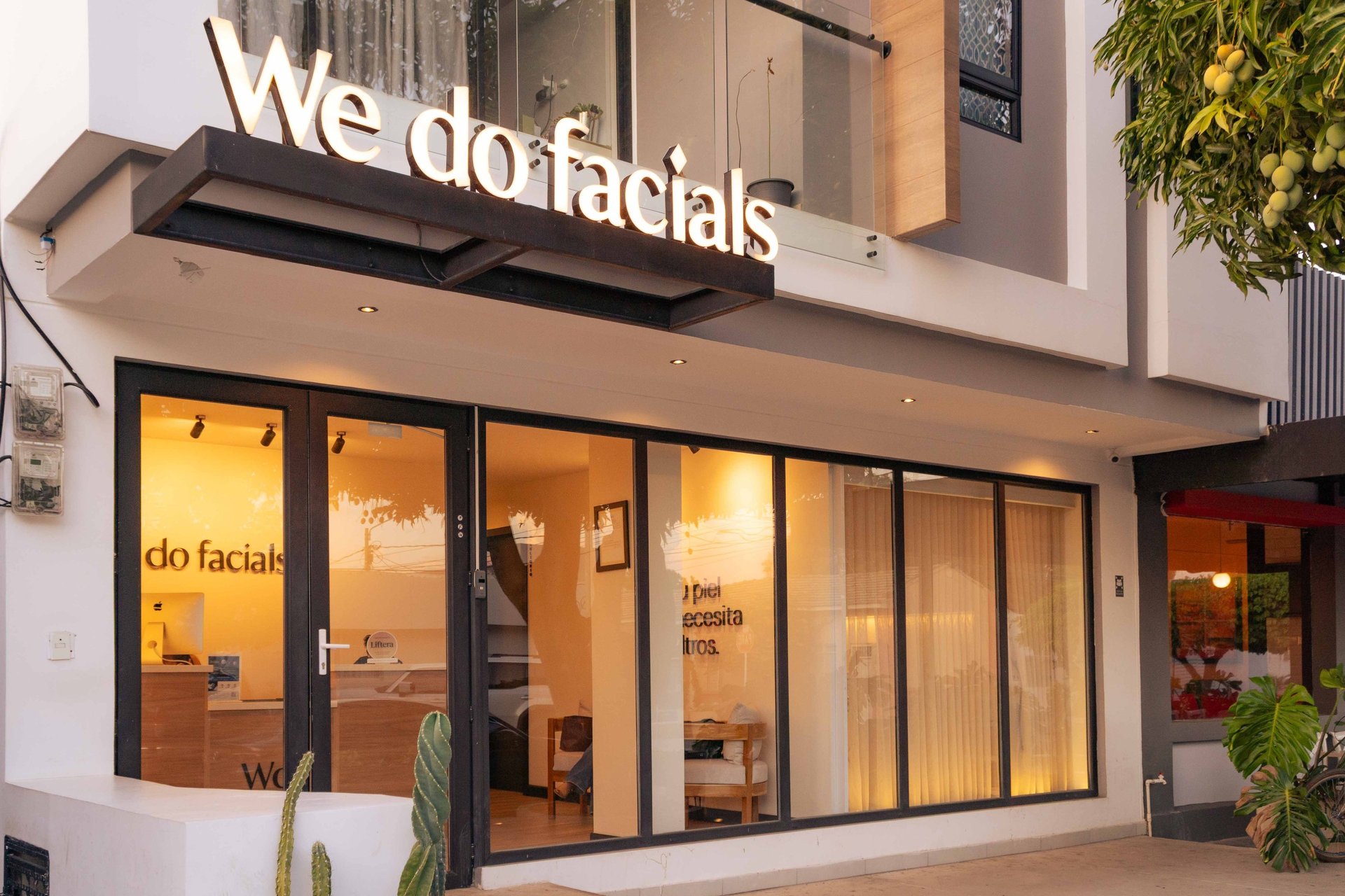an abstract photo of a curved building with a blue sky in the background