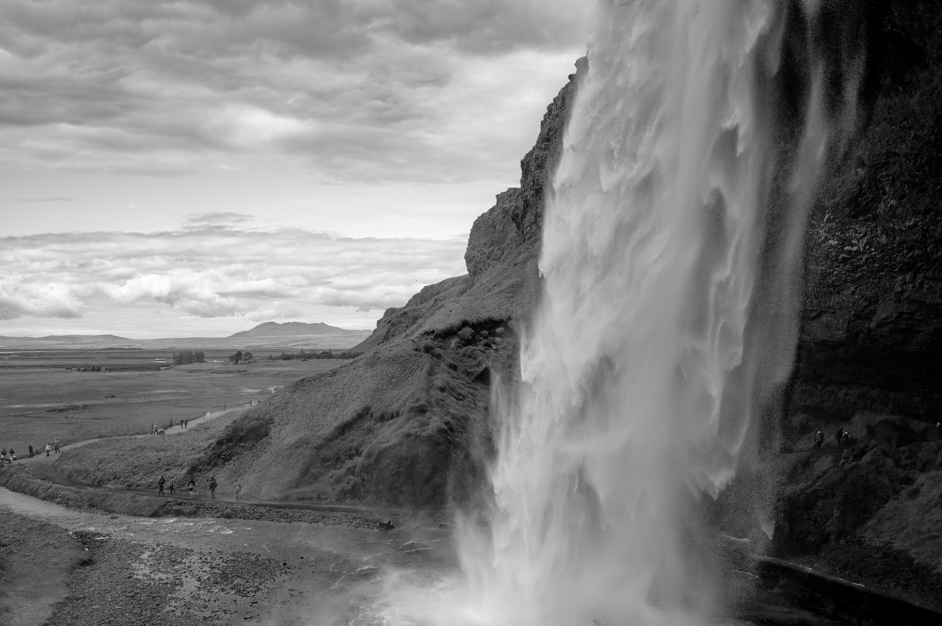 an abstract photo of a curved building with a blue sky in the background