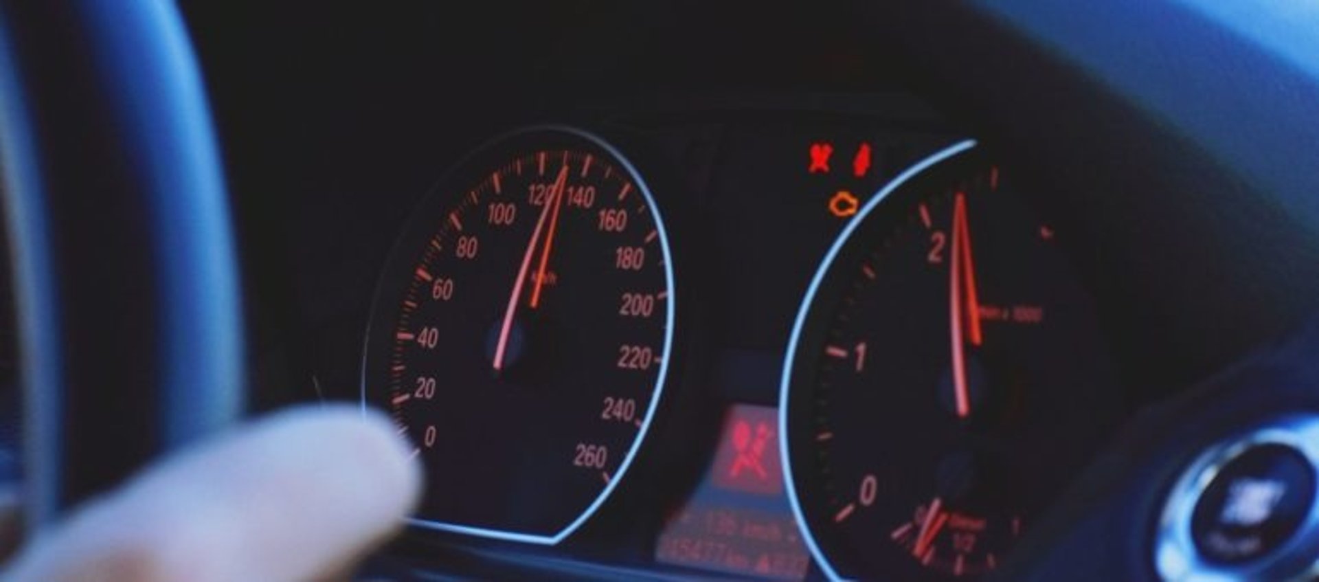 a close up of a speedometer on a motorcycle