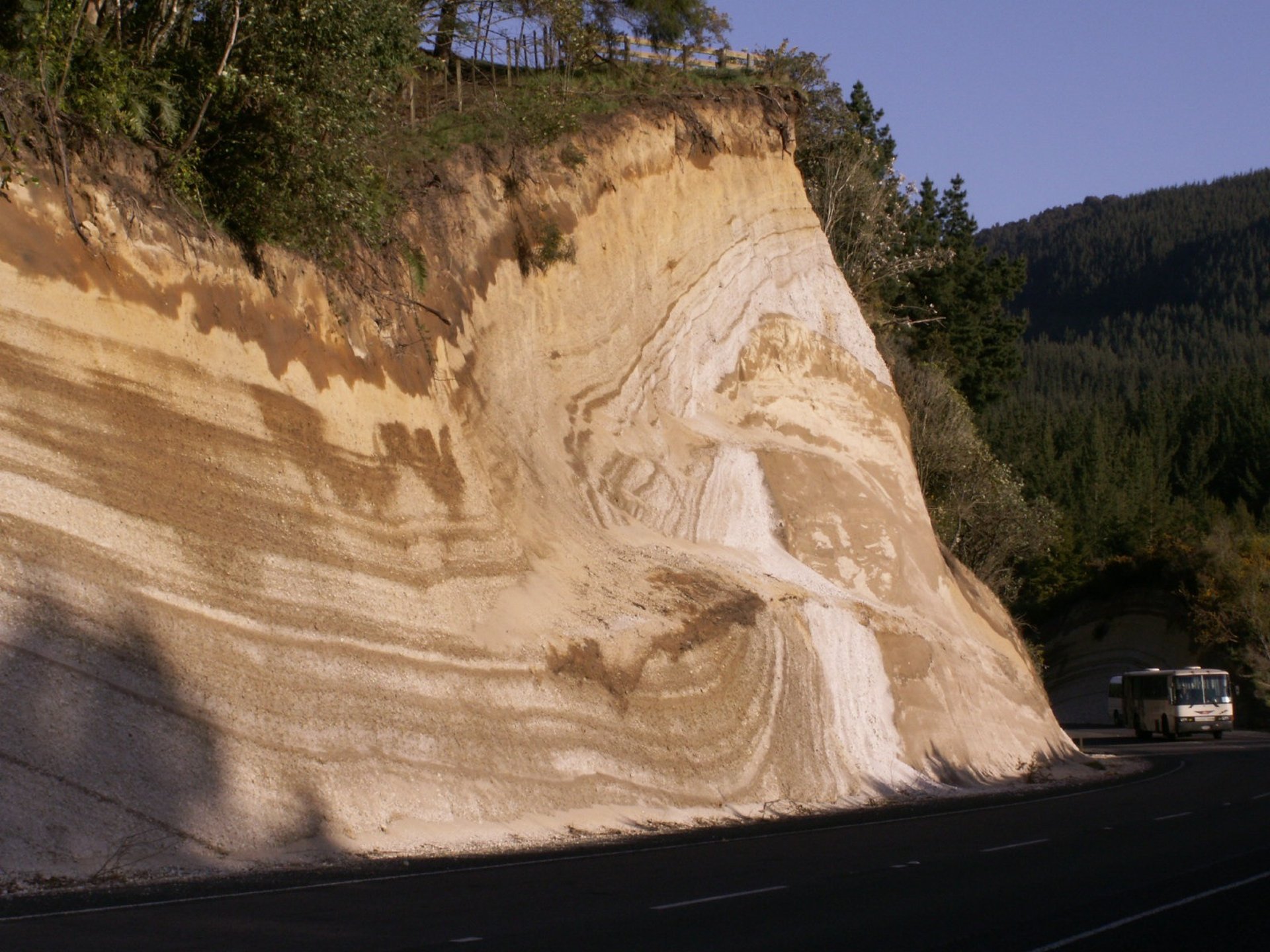 black and brown leather padded tub sofa