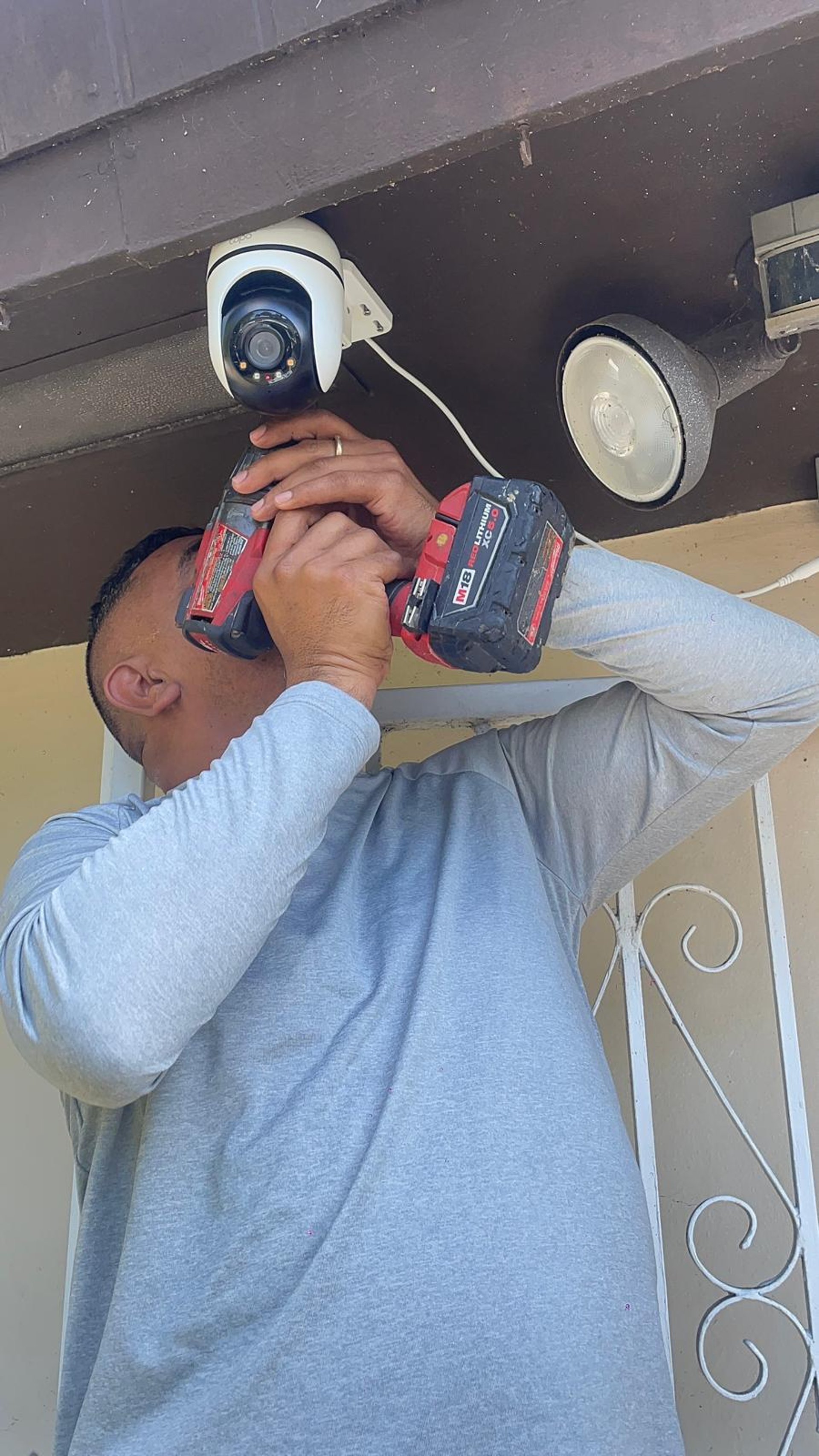 woman wearing yellow long-sleeved dress under white clouds and blue sky during daytime