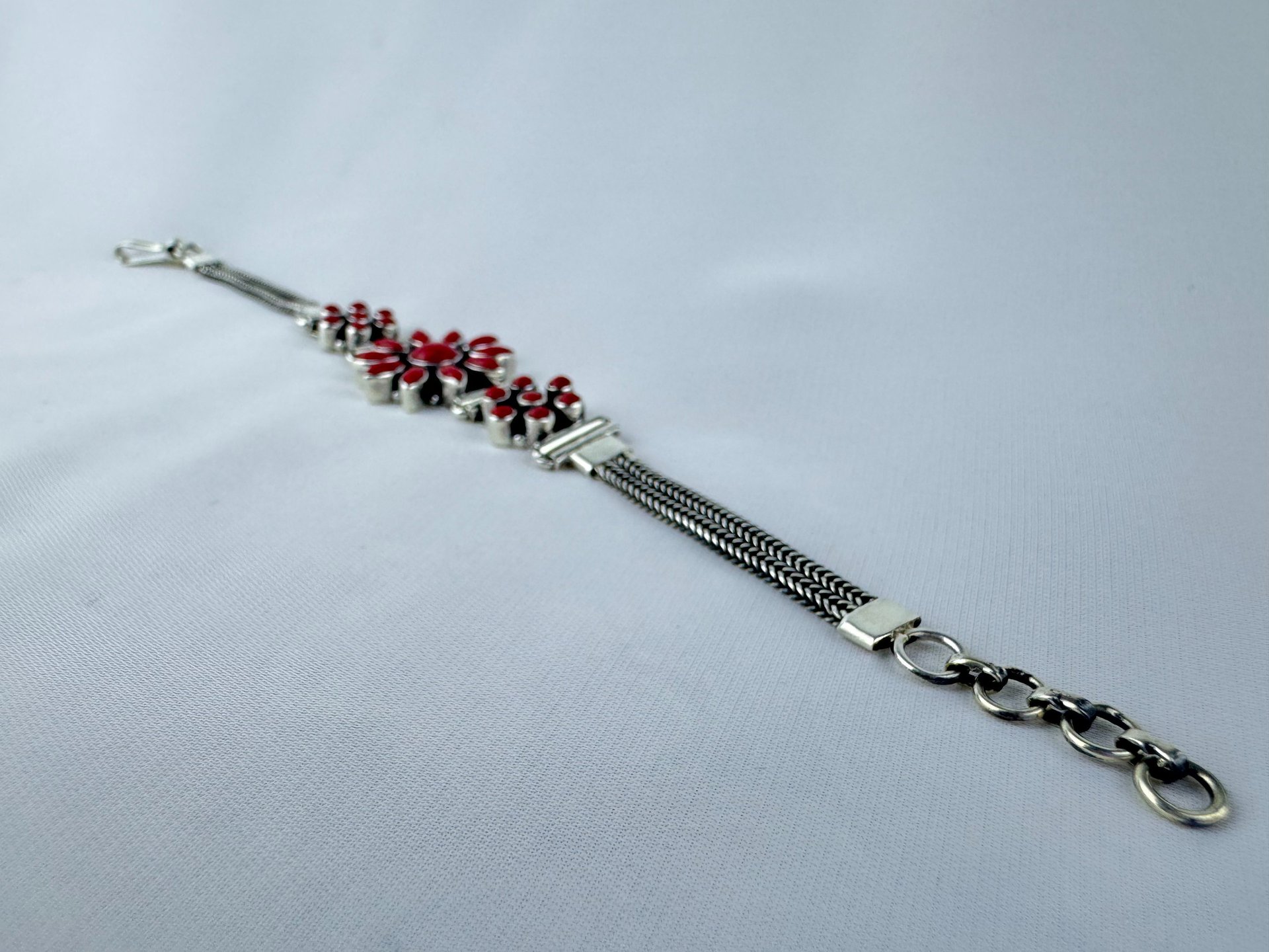 person in black shirt standing in front of brown wooden table with brown and white wooden