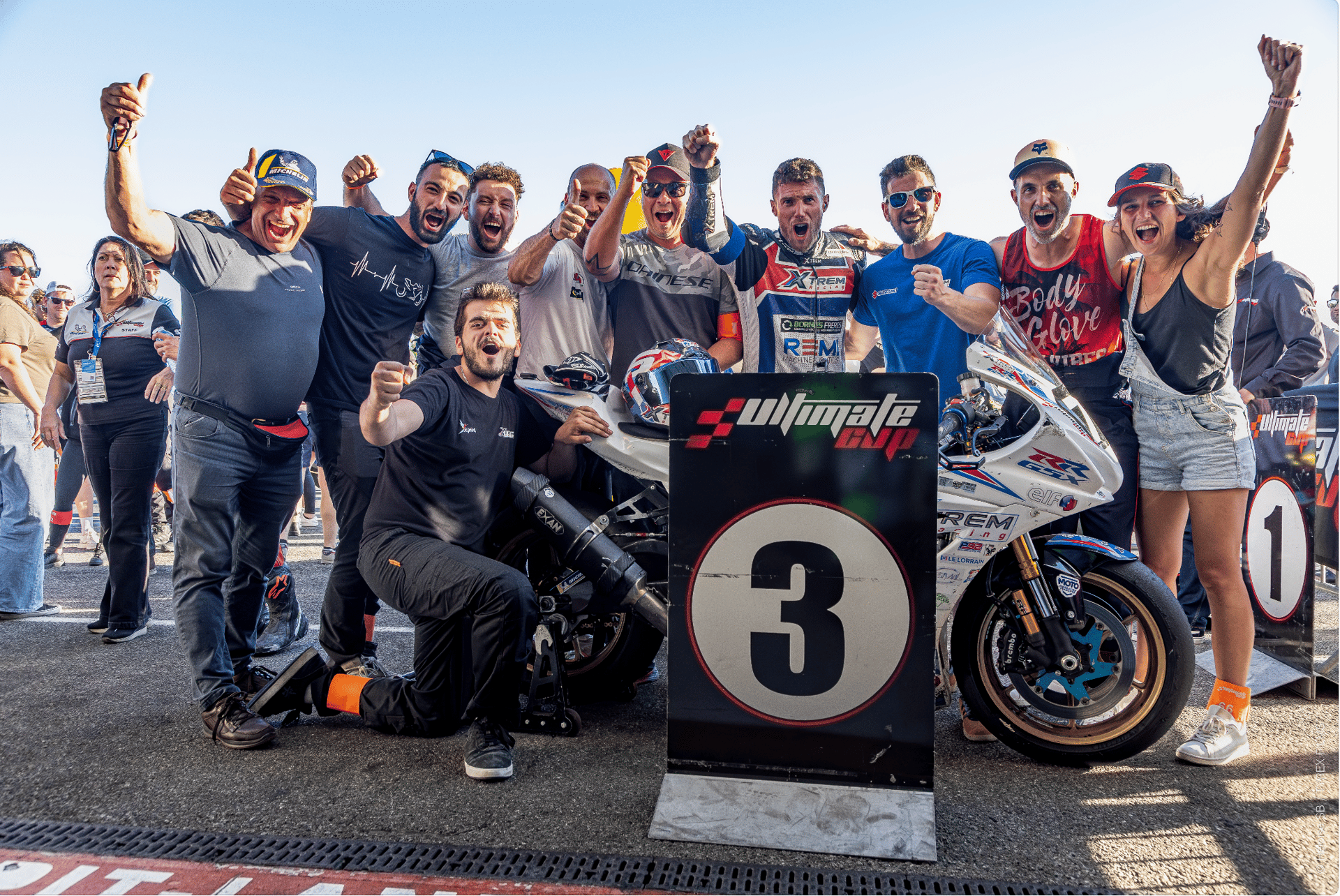an abstract photo of a curved building with a blue sky in the background