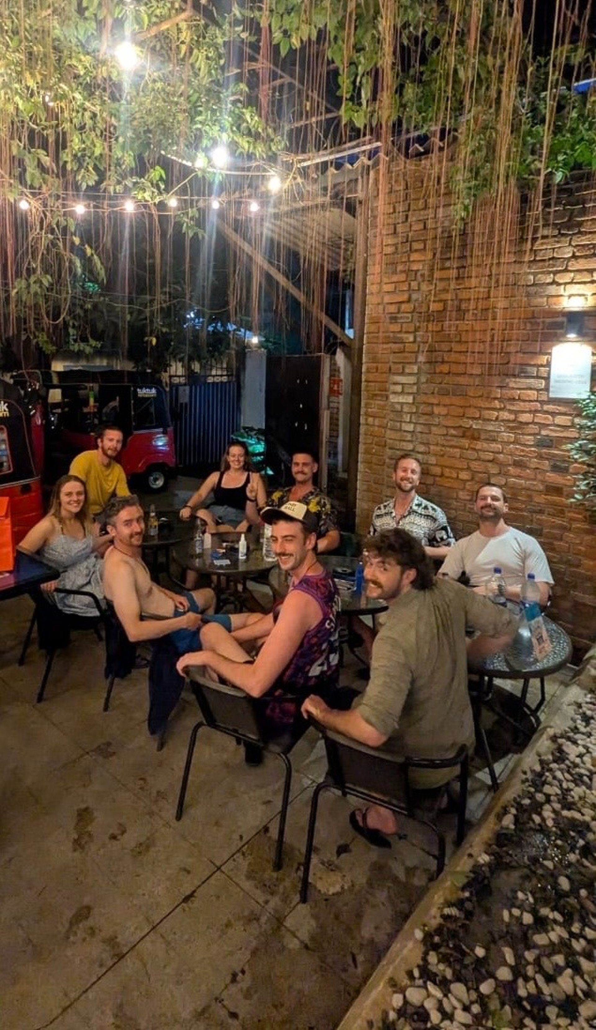 black and brown leather padded tub sofa