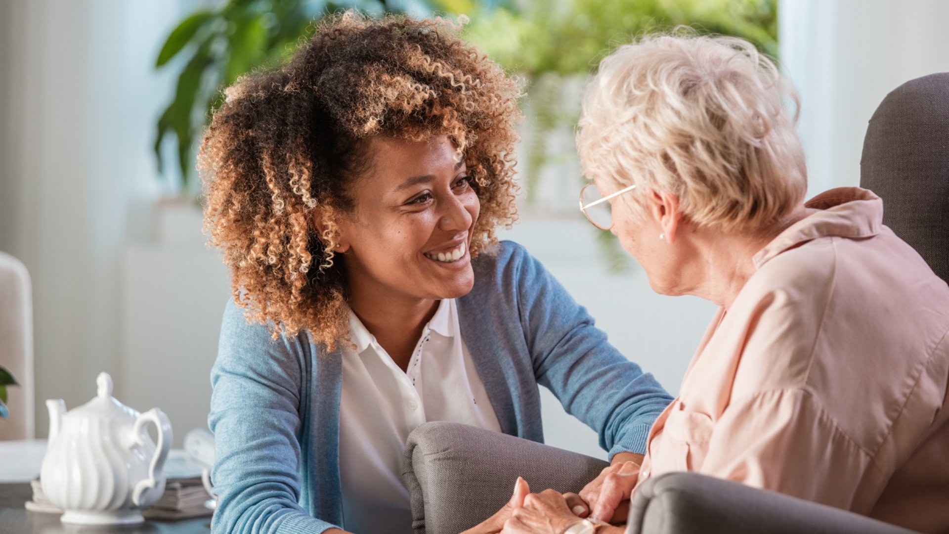 black and brown leather padded tub sofa