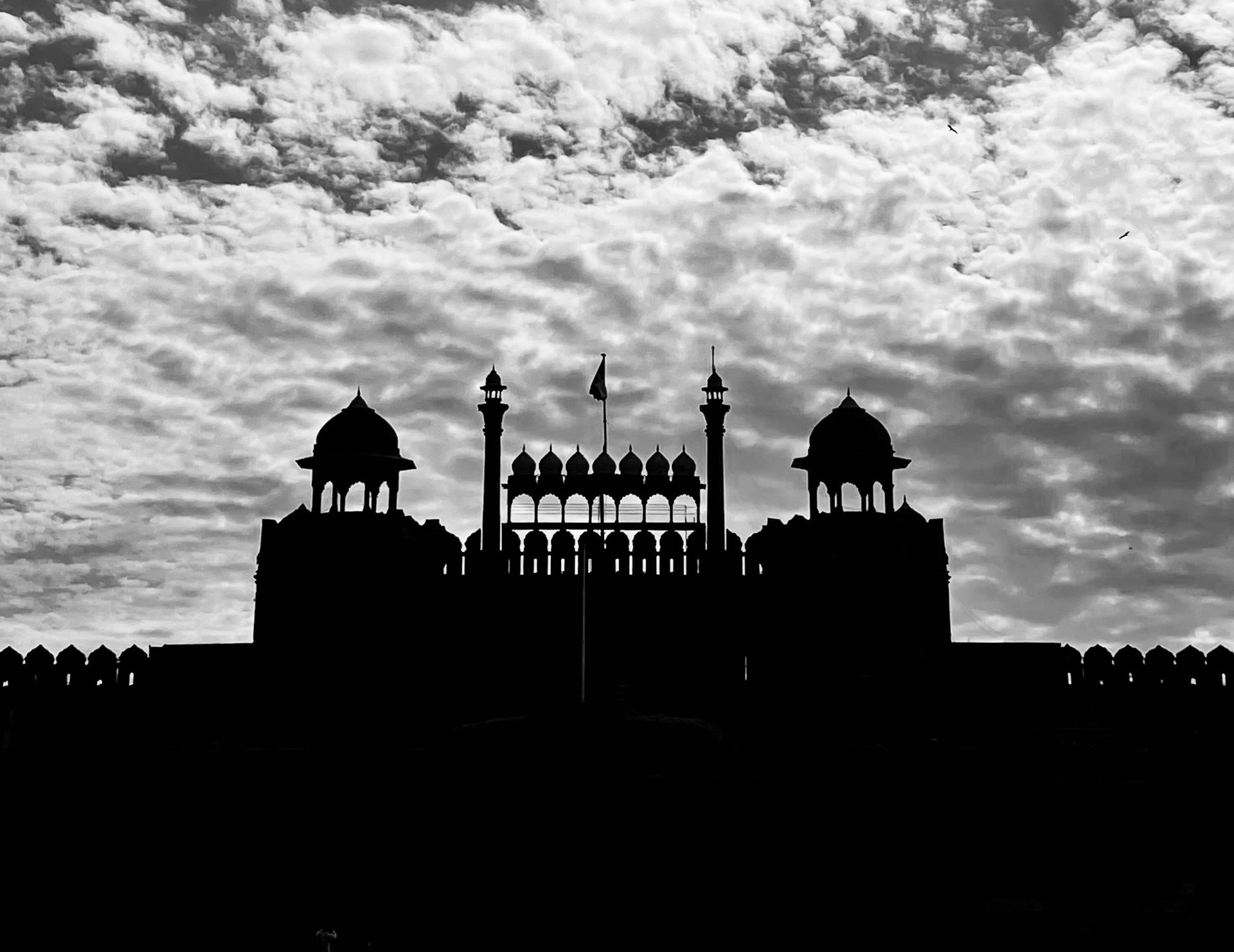 a black and white photo of the supreme court