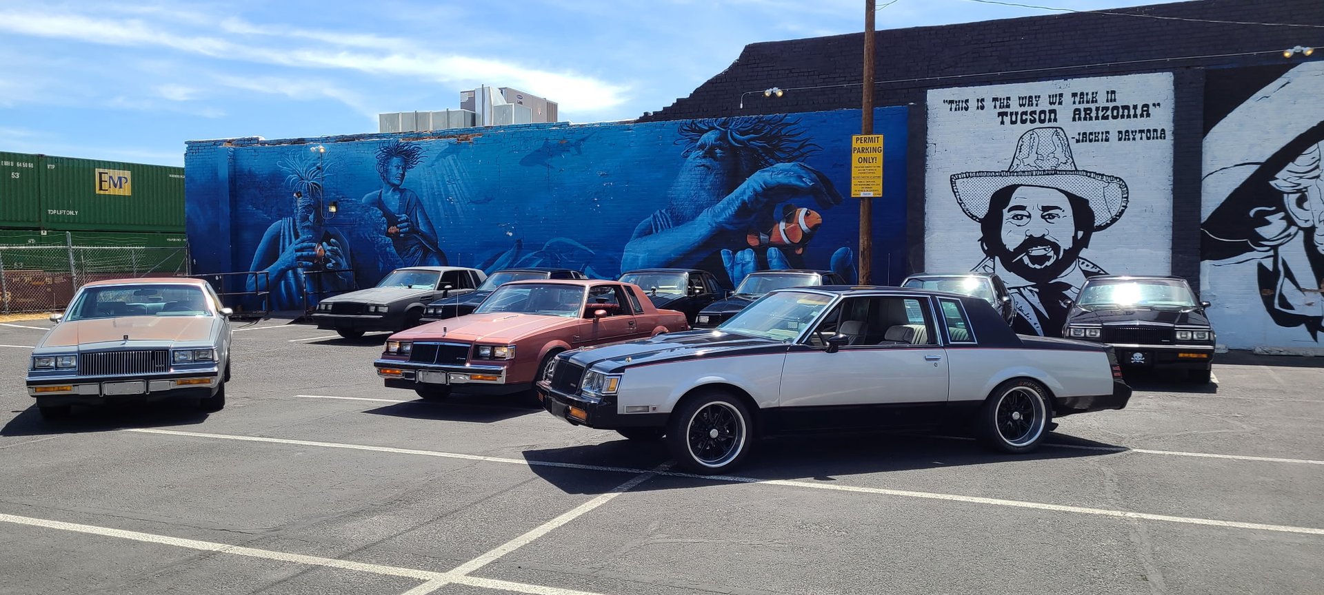 a close up of the front of a blue car