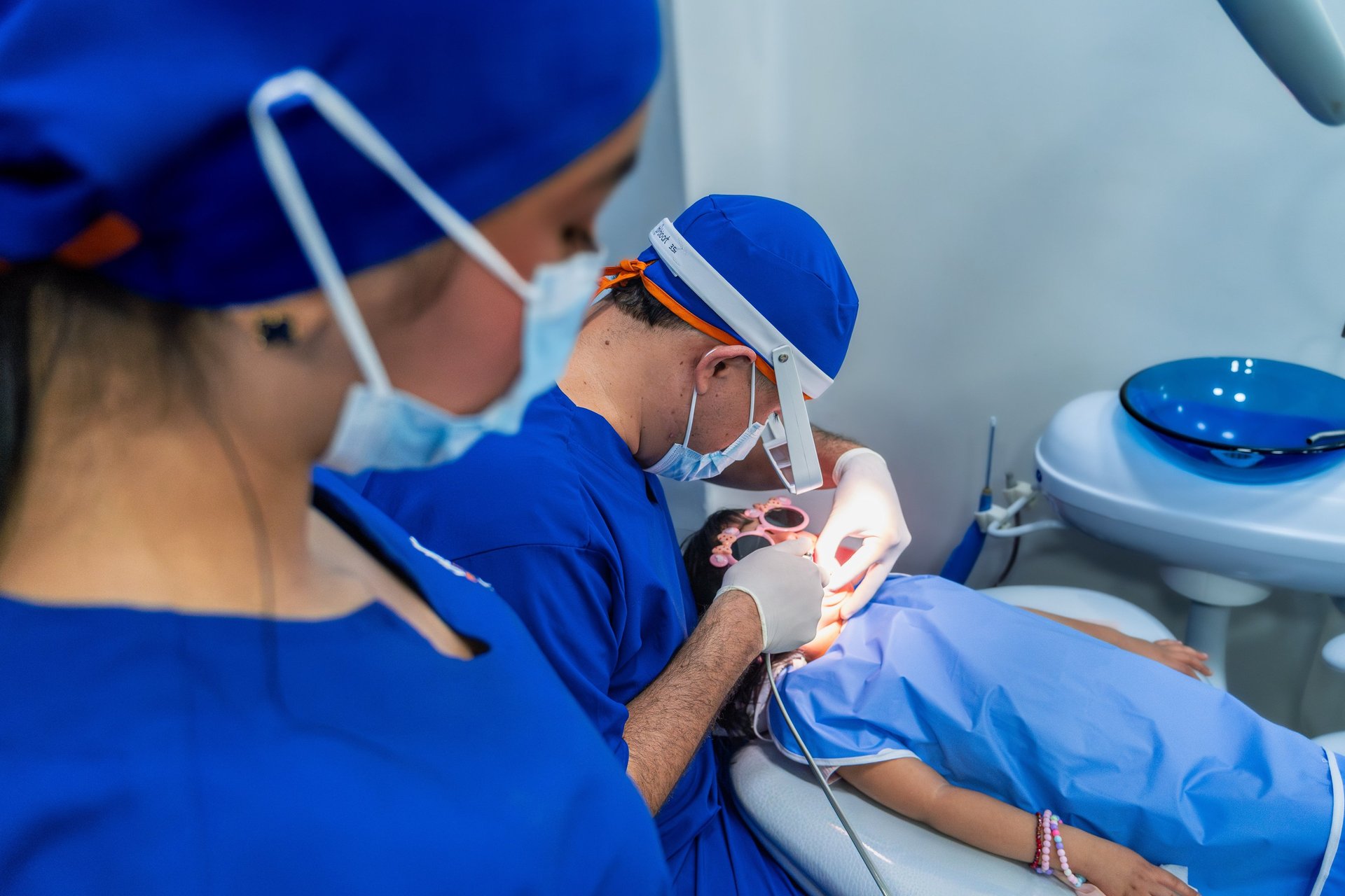 woman wearing yellow long-sleeved dress under white clouds and blue sky during daytime