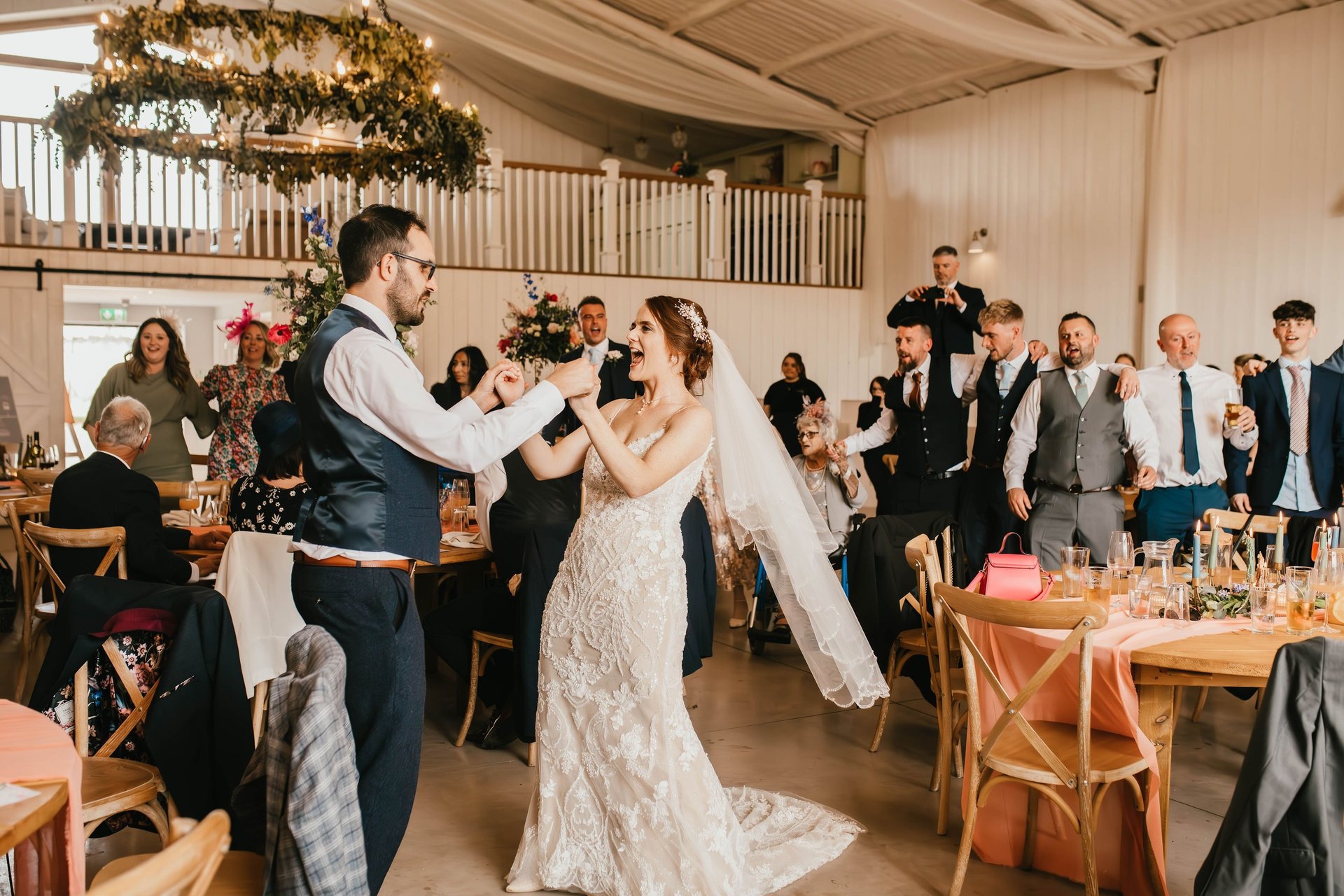 black and brown leather padded tub sofa