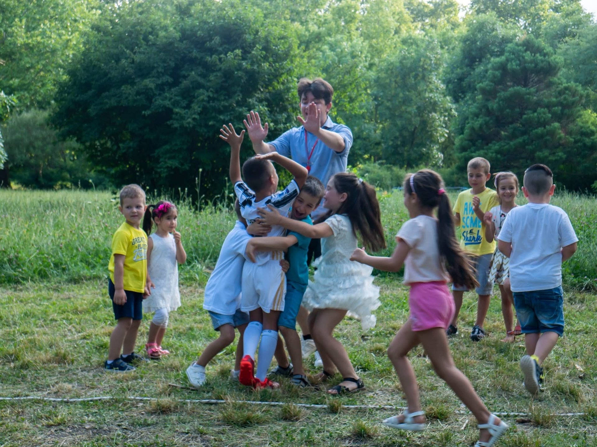 woman wearing yellow long-sleeved dress under white clouds and blue sky during daytime