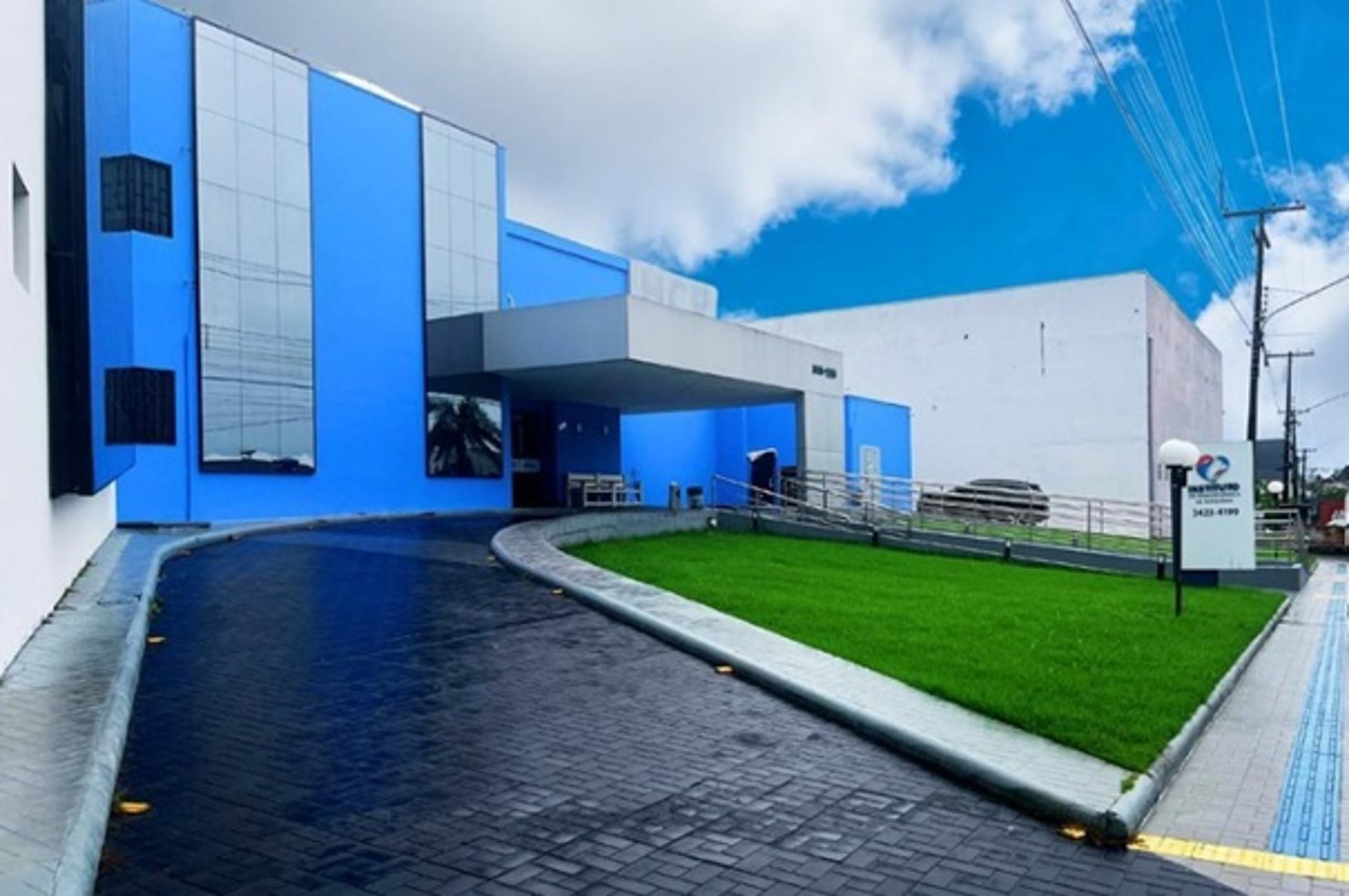 woman wearing yellow long-sleeved dress under white clouds and blue sky during daytime