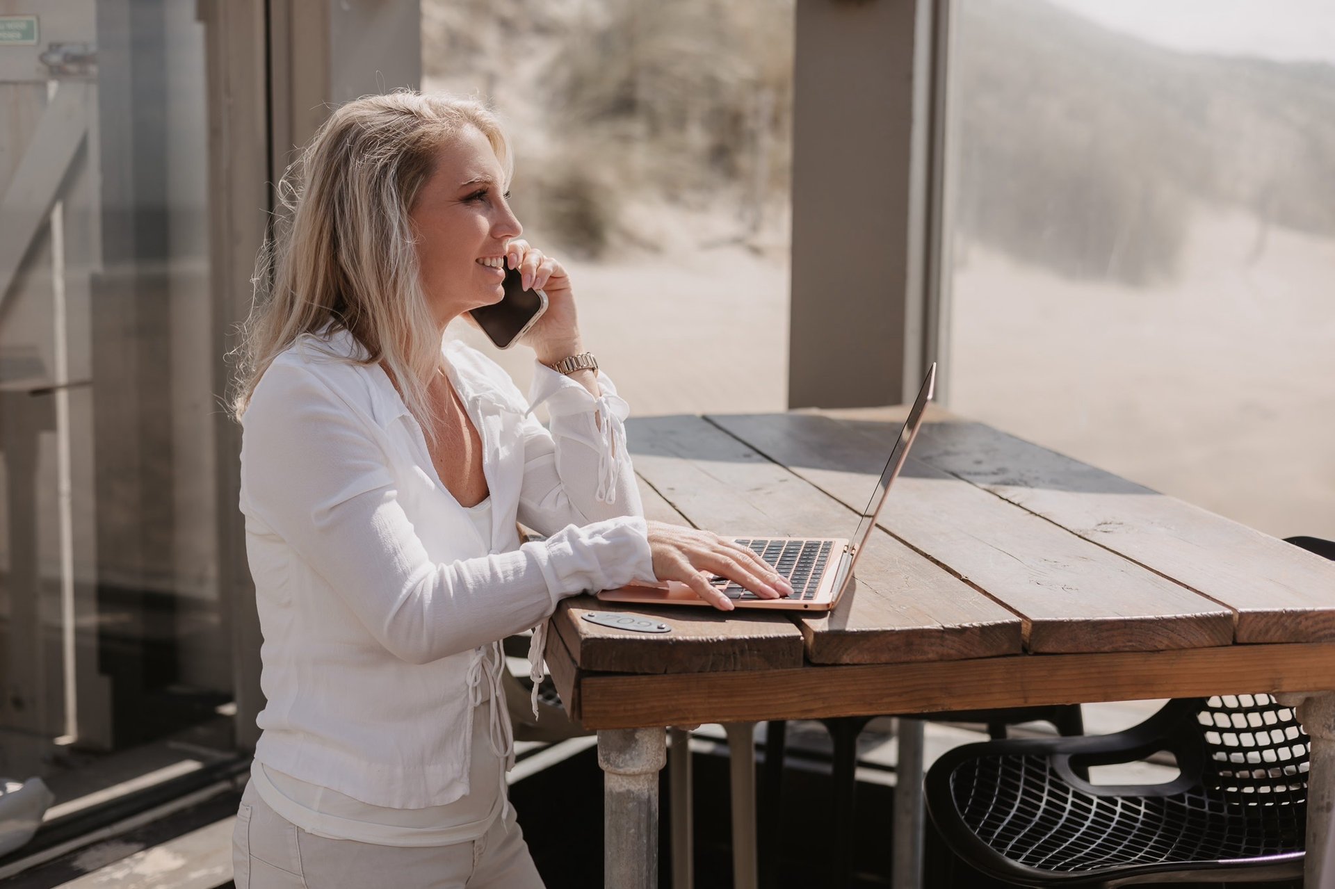 an abstract photo of a curved building with a blue sky in the background