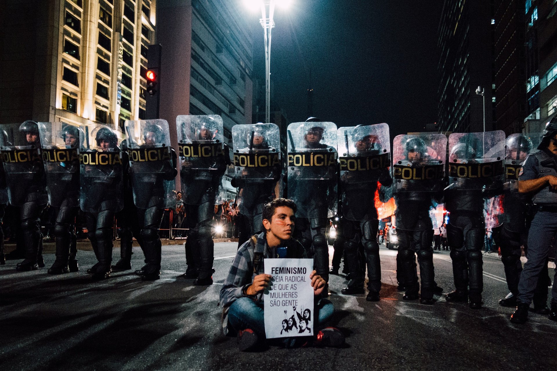 an abstract photo of a curved building with a blue sky in the background