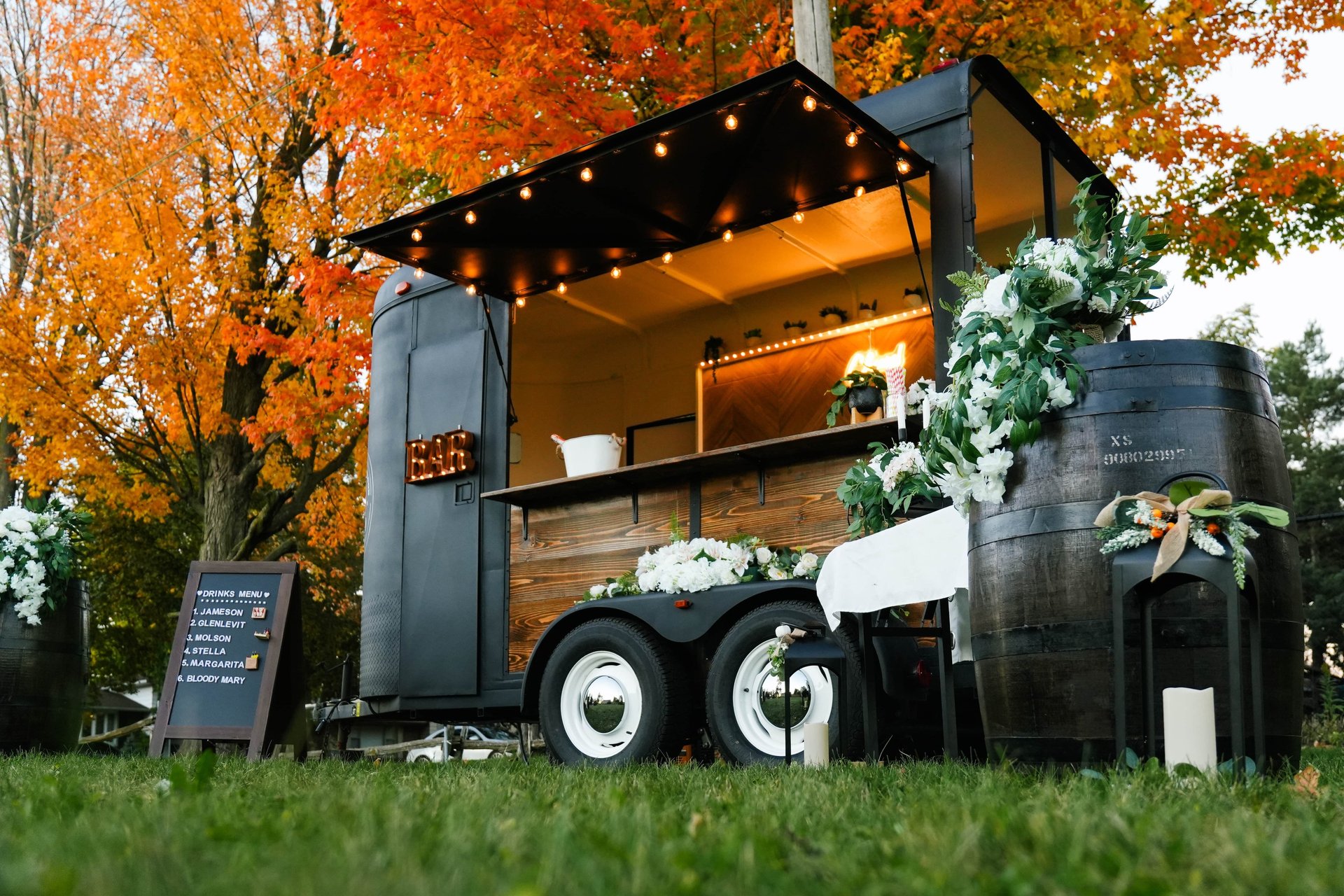 black and brown leather padded tub sofa
