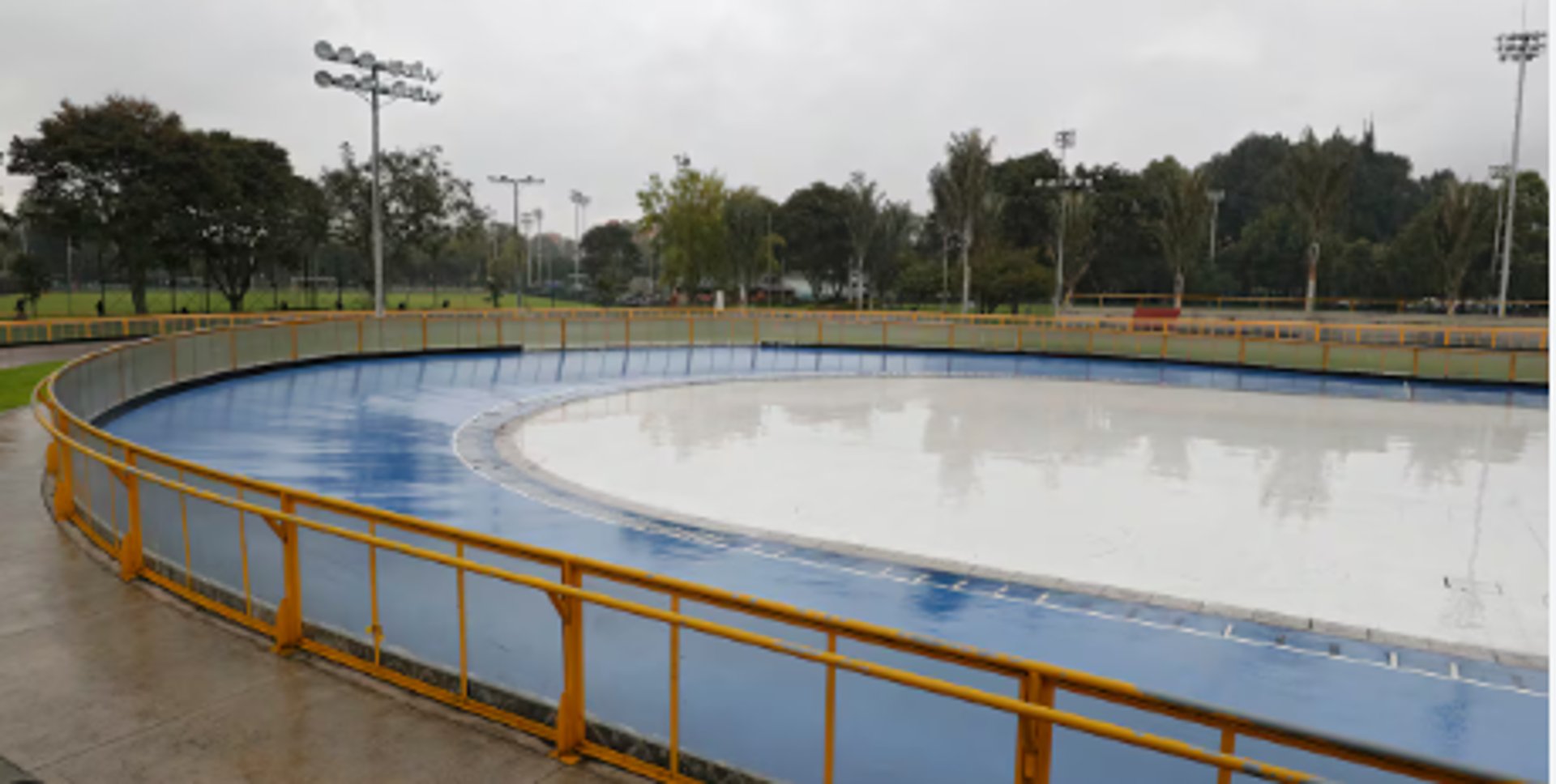 woman wearing yellow long-sleeved dress under white clouds and blue sky during daytime