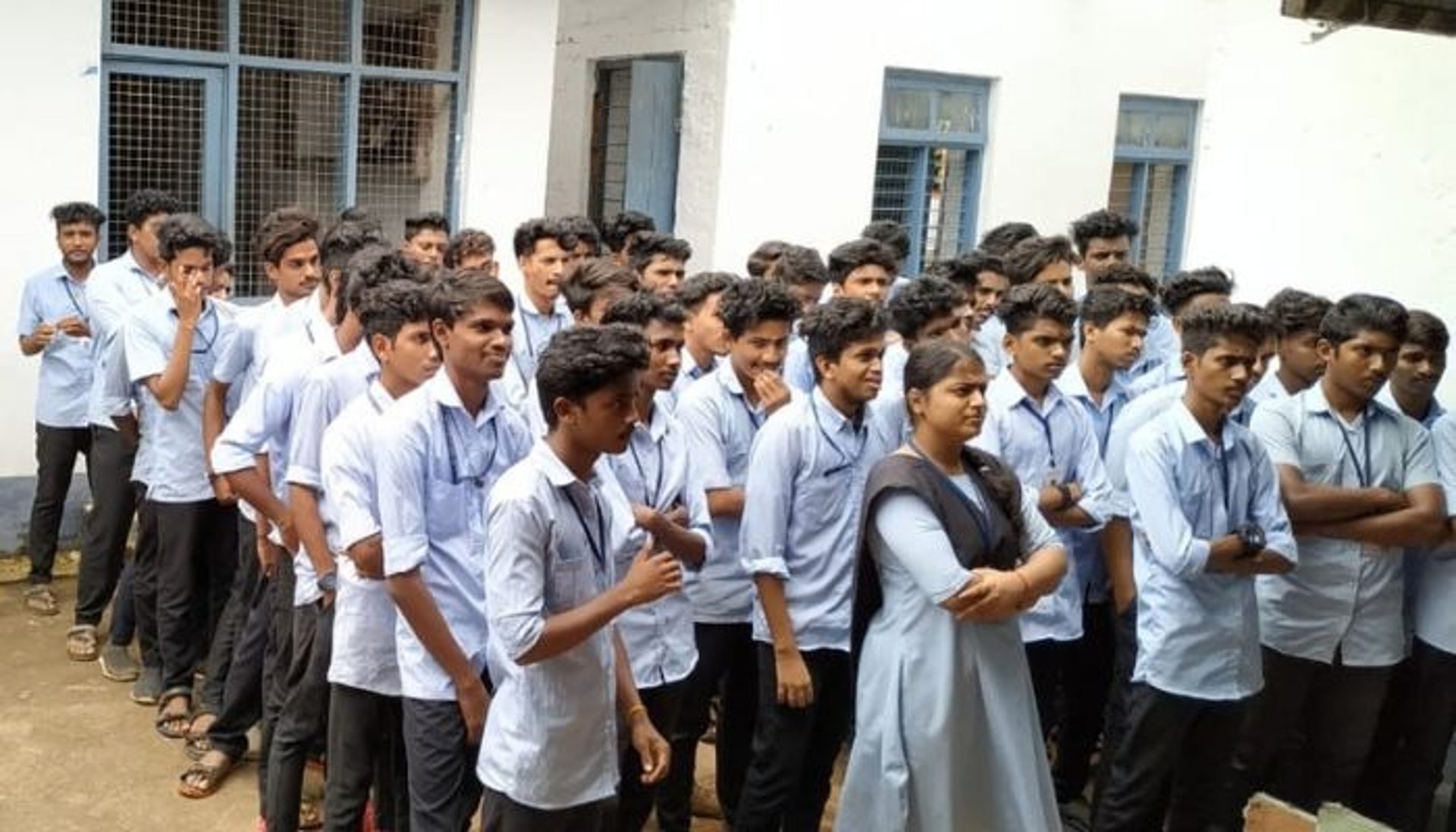 woman wearing yellow long-sleeved dress under white clouds and blue sky during daytime