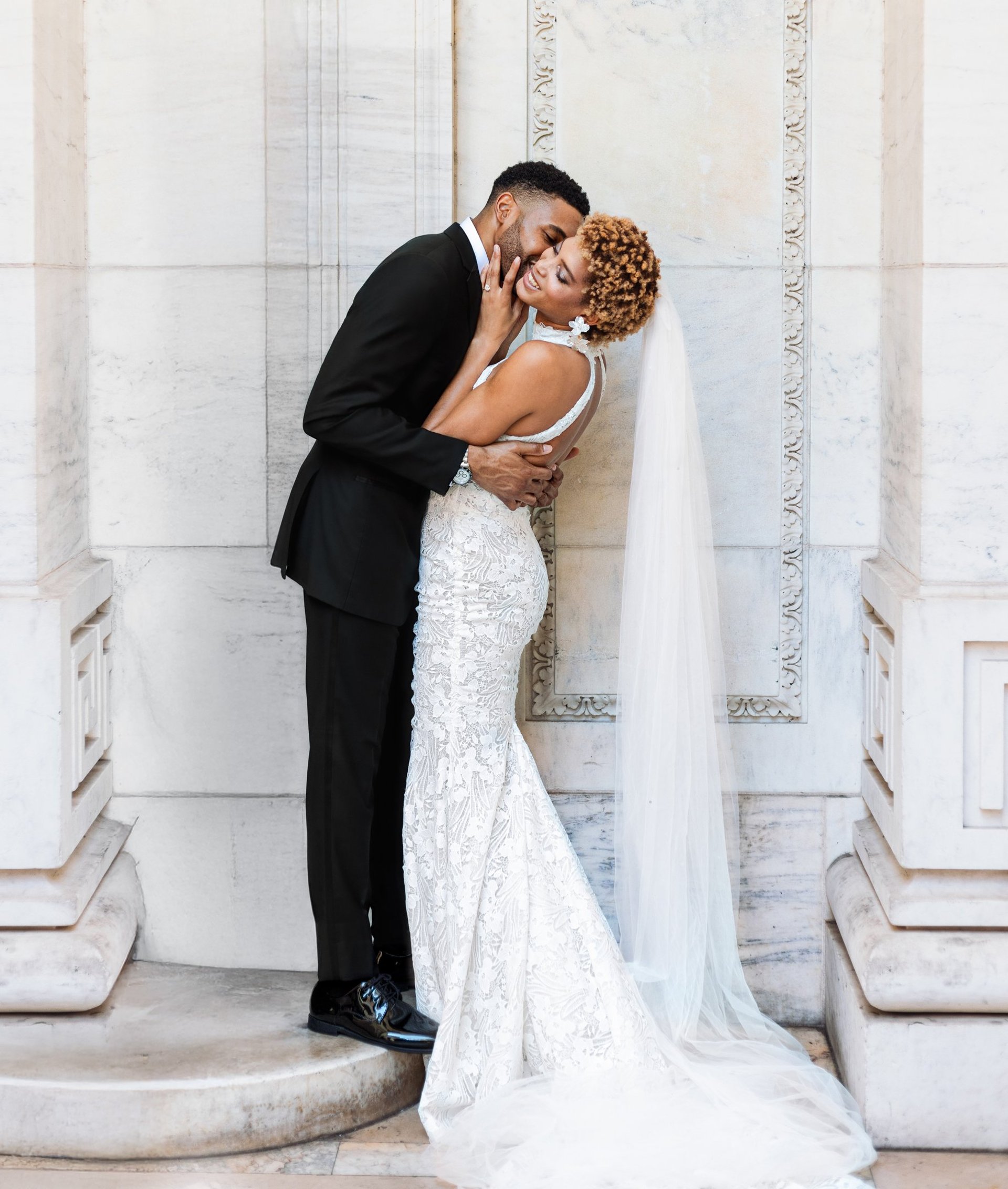 A man and a woman standing next to each other