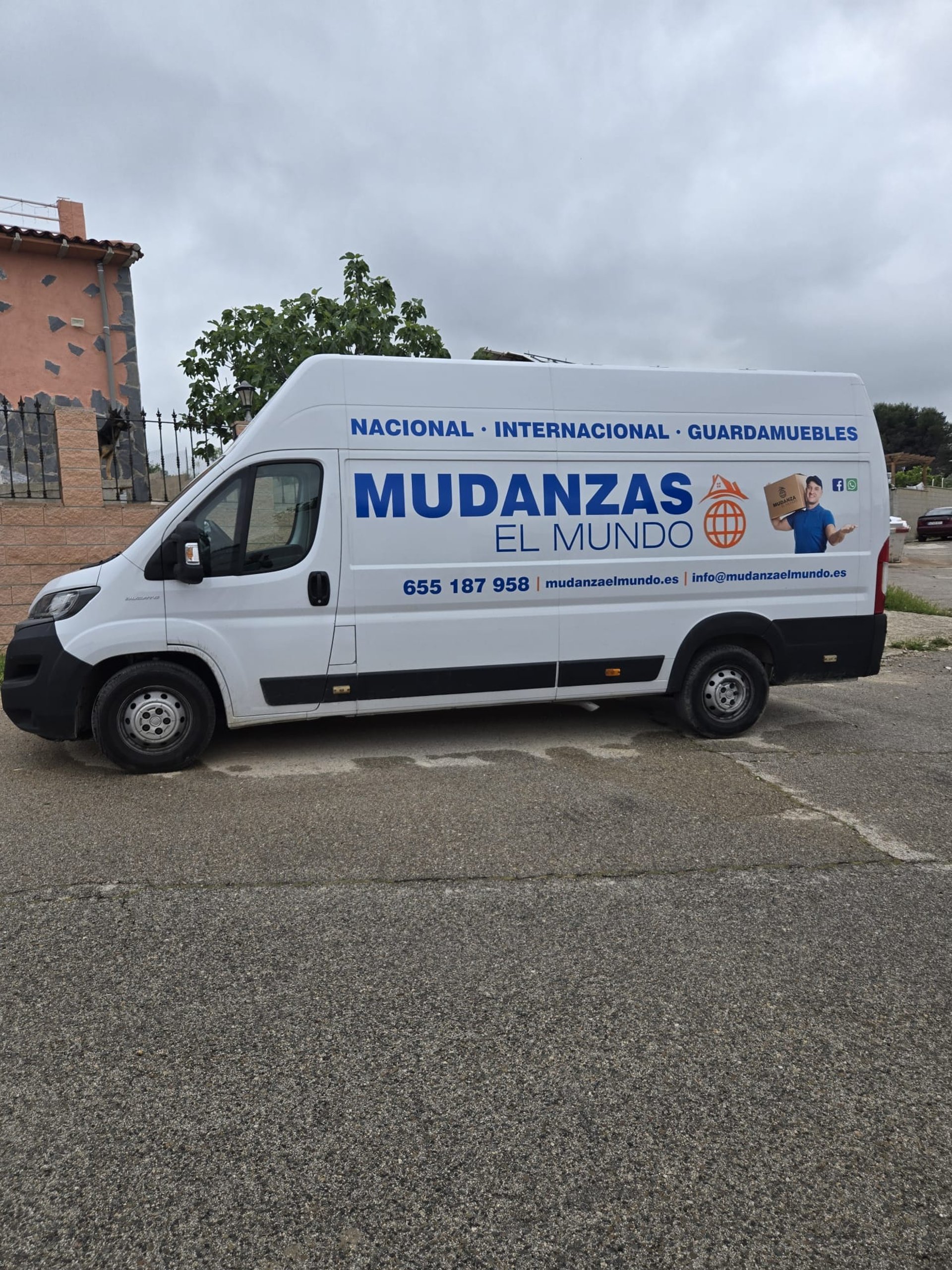 woman wearing yellow long-sleeved dress under white clouds and blue sky during daytime