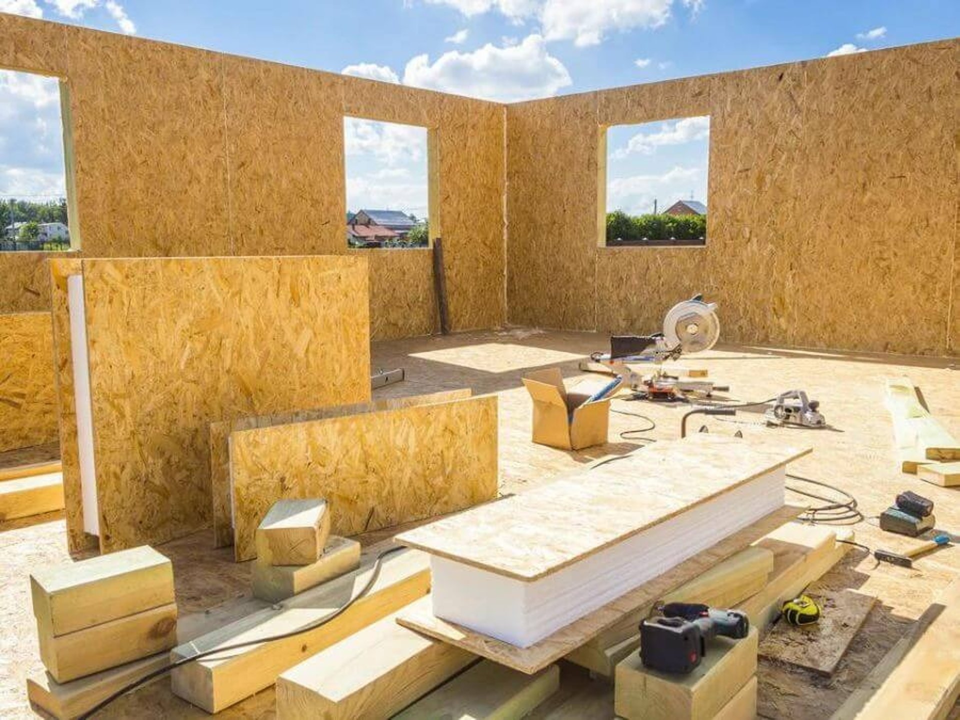 an airplane is flying in the blue sky