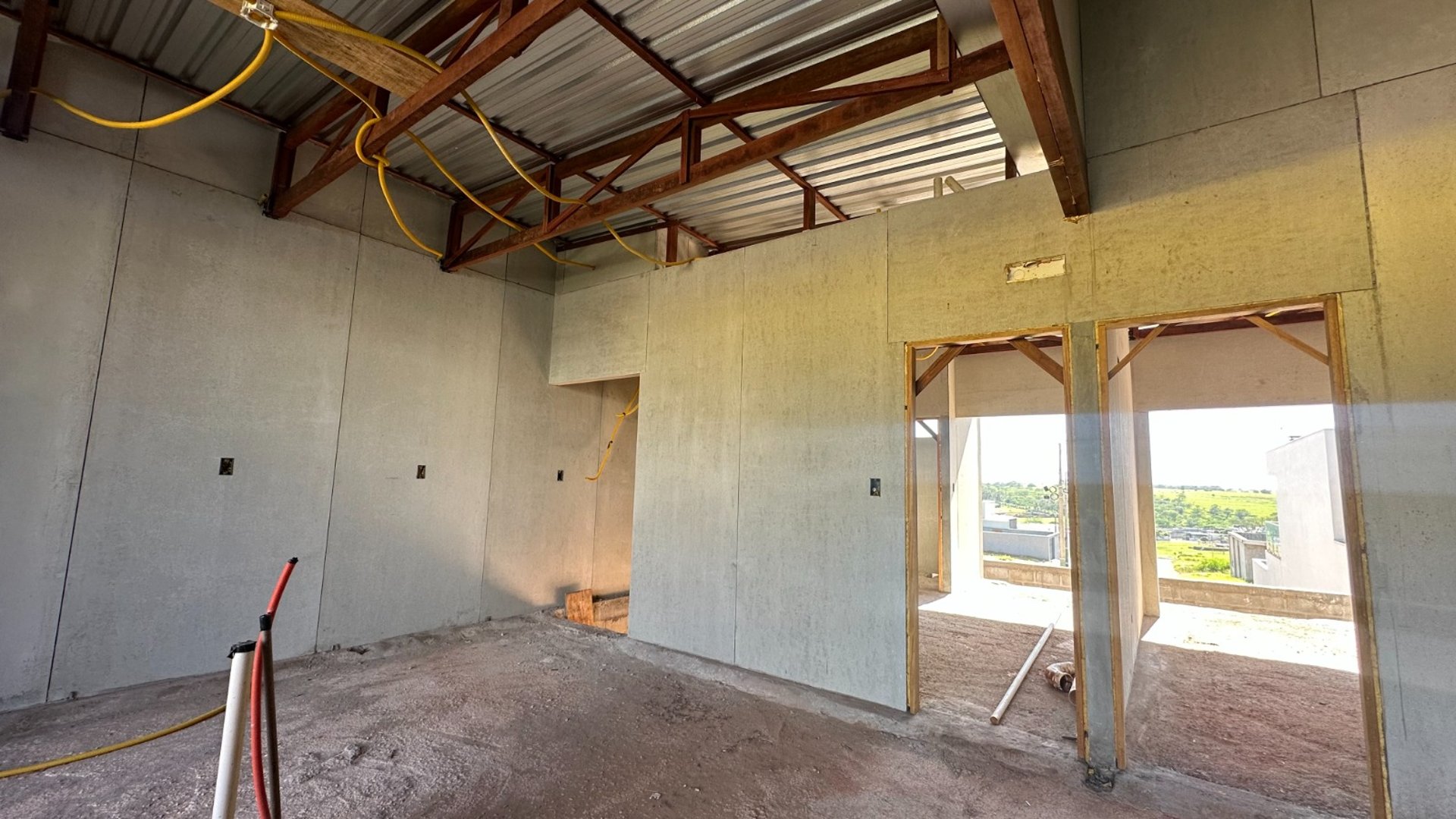 A man standing on top of a skateboard ramp