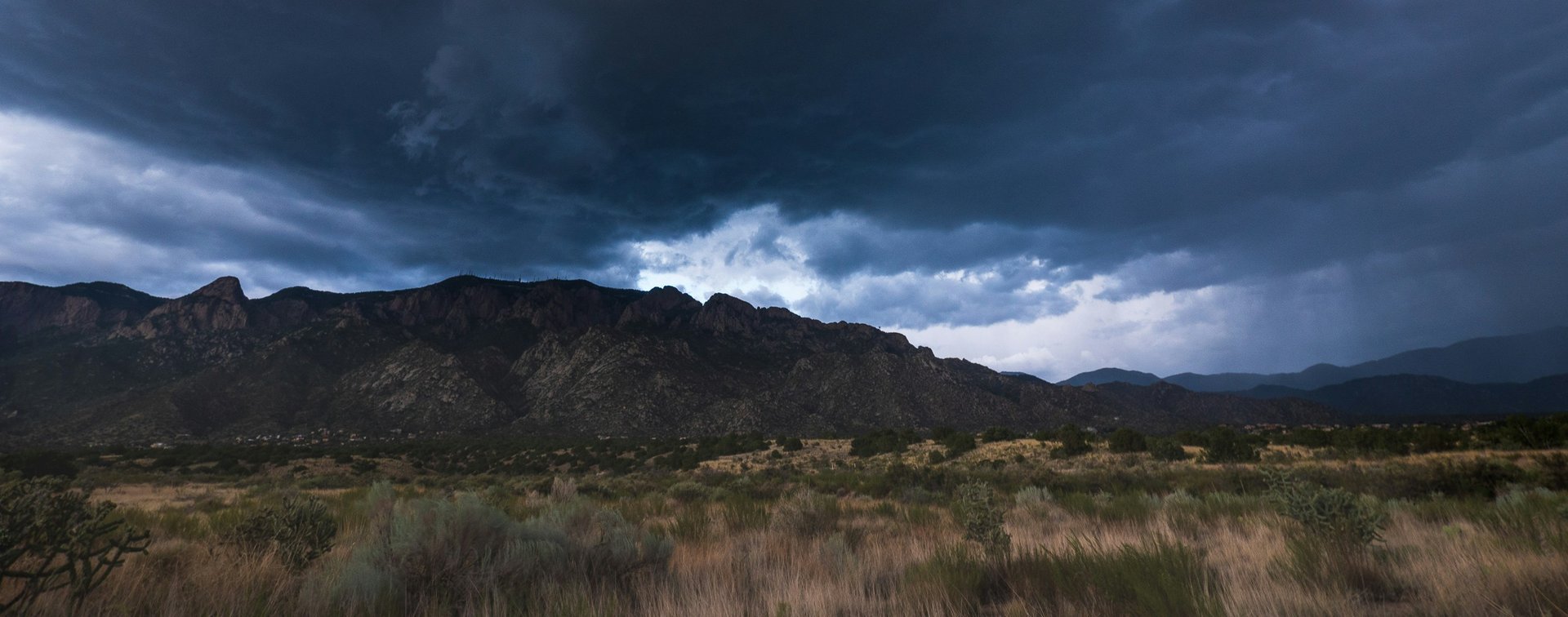 Sandia Mountains under evening overcast