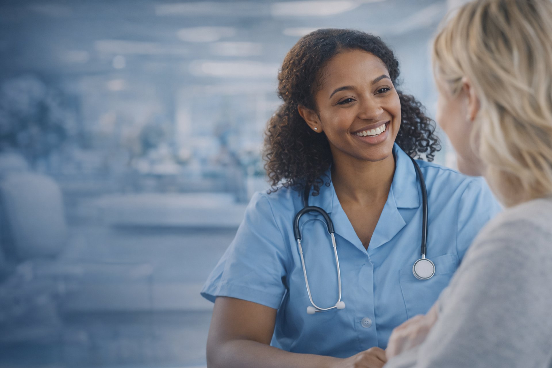 A long hallway with a row of chairs next to a wall